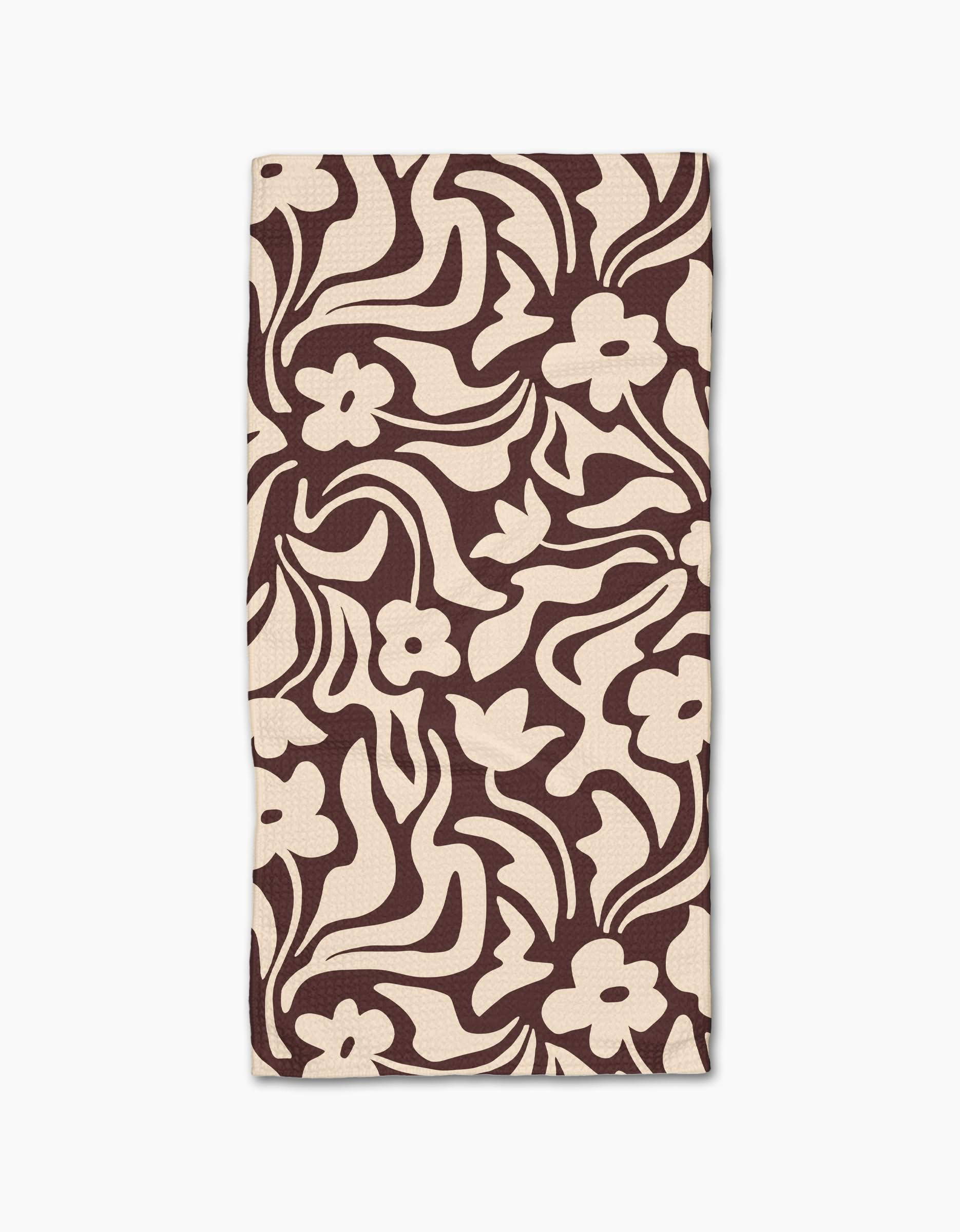 Floral Reverie by Gerdadzy is a beige rectangular cloth napkin with an abstract dark brown floral pattern of stylized flowers and wavy leaves, crafted from recycled materials for an eco-friendly touch.