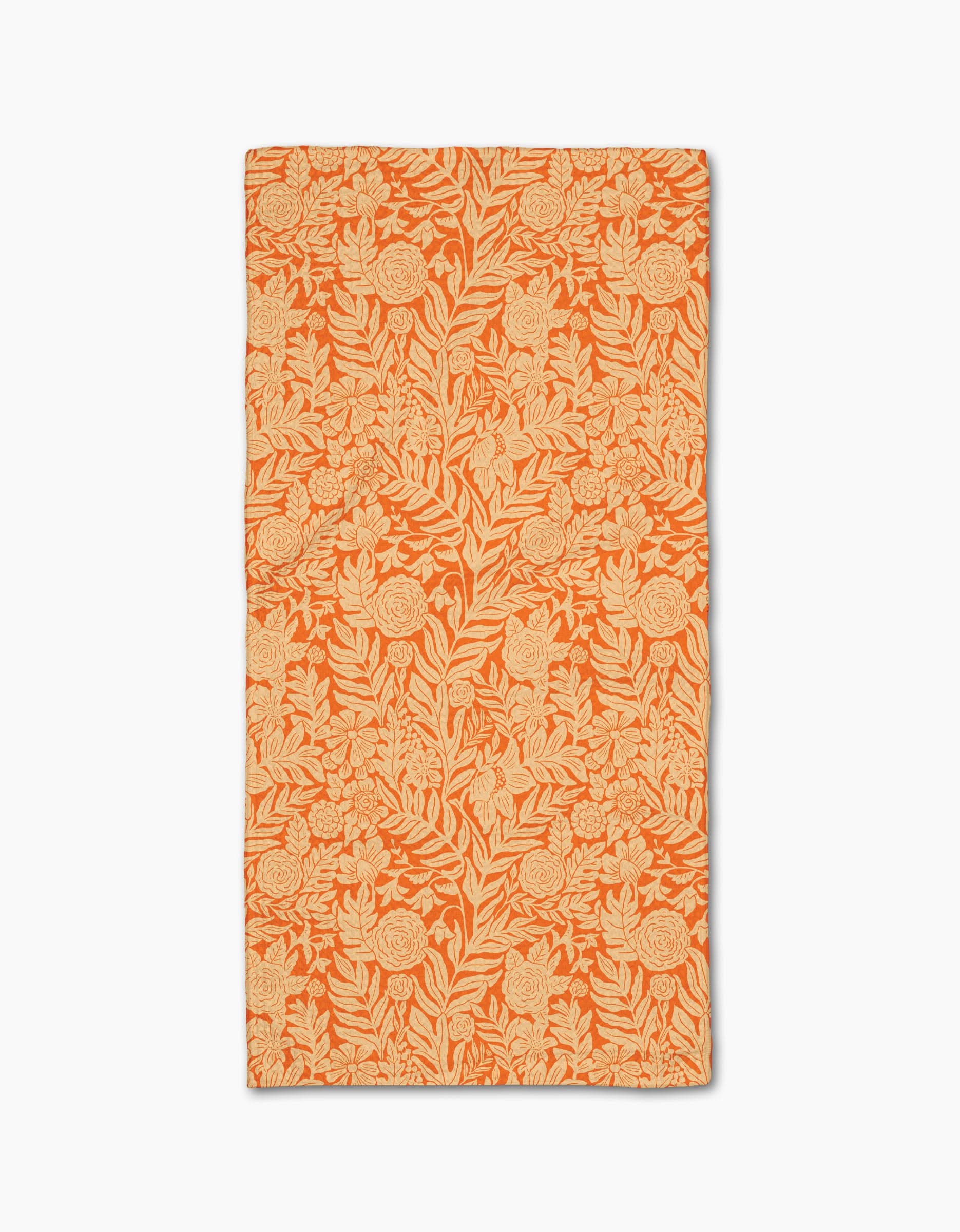 Florence by Katie OShea is an orange rectangular recycled kitchen towel featuring a light tan floral and leafy pattern throughout and slightly uneven edges for a handcrafted appearance.