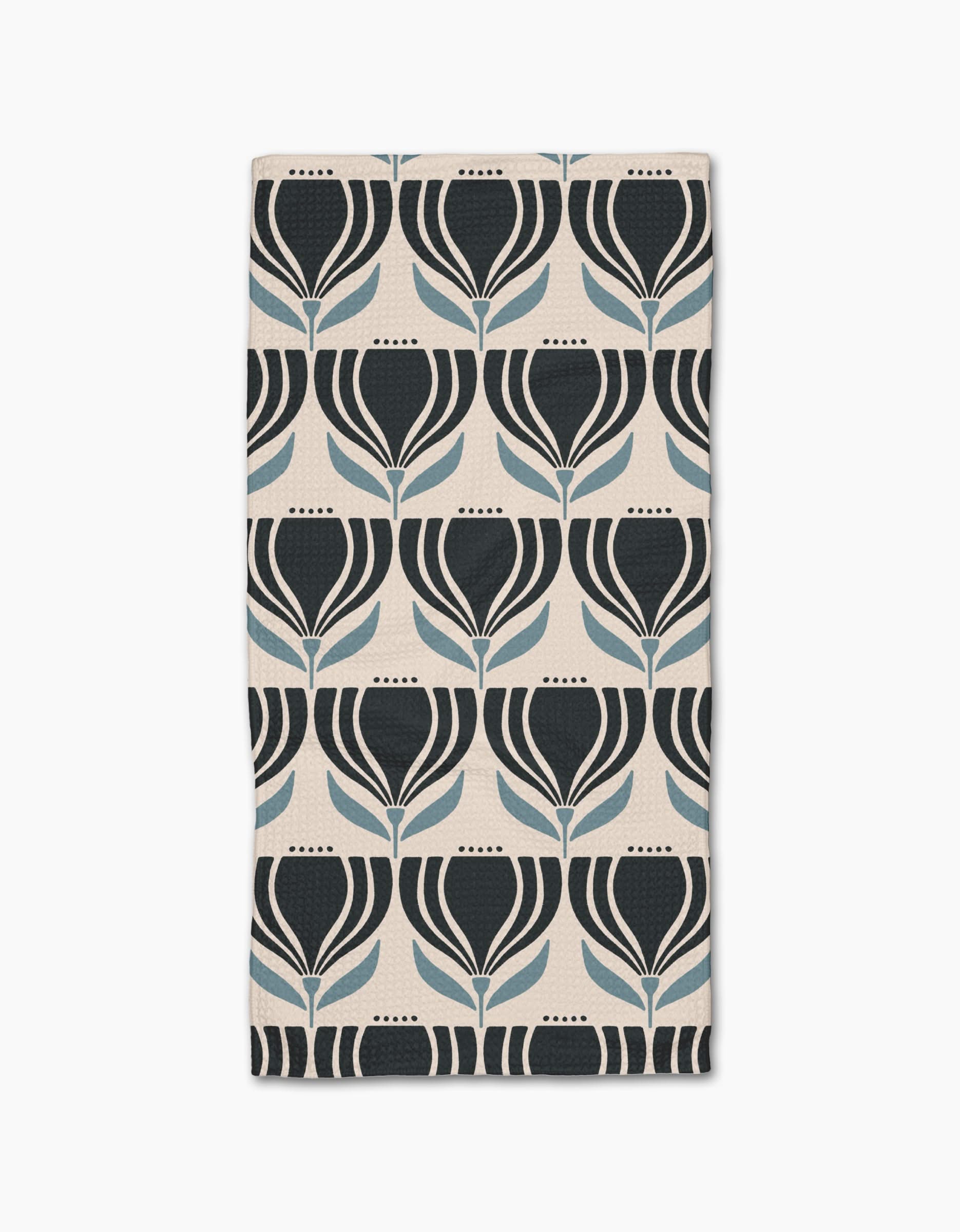 The Florian bar towel by Amy MacCready features a geometric tulip pattern in black and blue on a light beige Geoweave fabric, arranged in neat rows and columns.