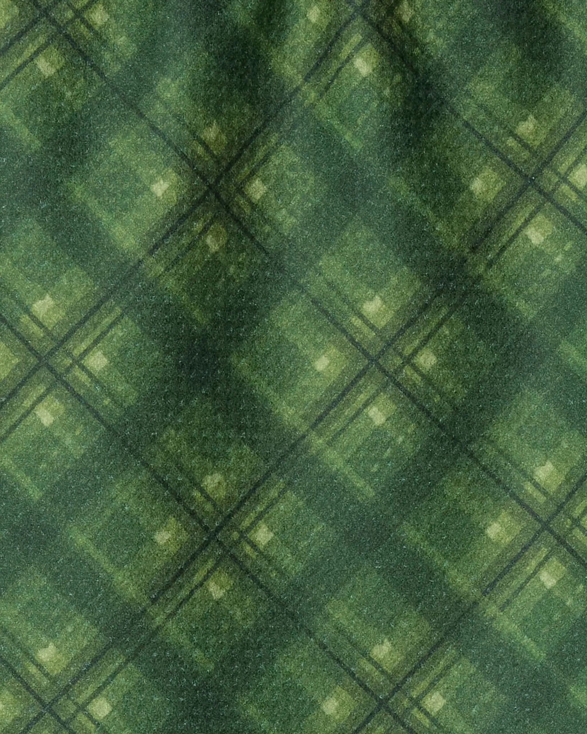 The Geometry Forever Plaid bar towel features a diagonal crisscross design in varied green shades with subtle texture. Crafted from recycled materials, it brings an eco-friendly and stylish touch to your kitchen.