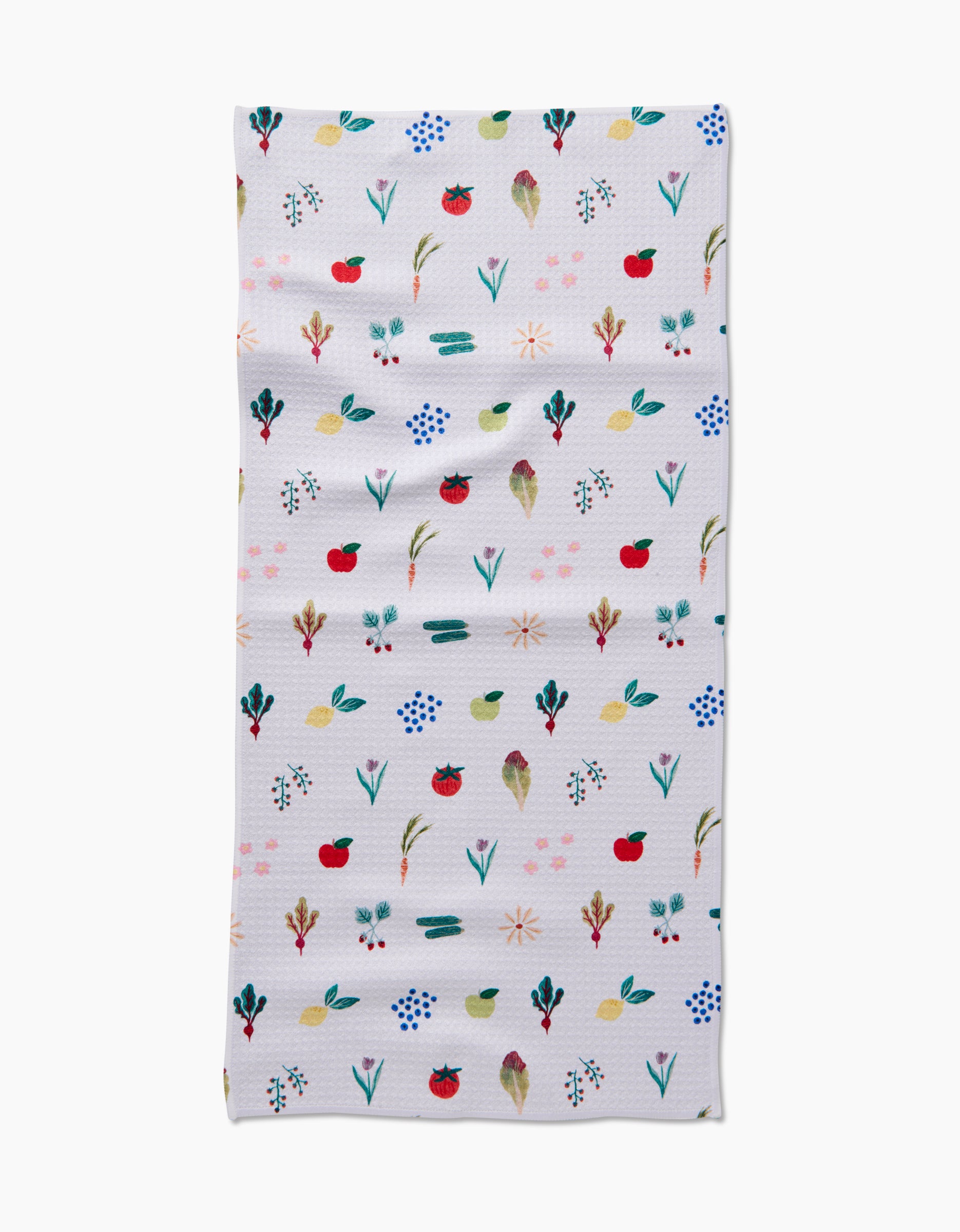 The Fresh Produce Geoweave cloth by Brittany Jepsen is a rectangular, ultra-absorbent white towel adorned with colorful, hand-painted flowers, leaves, and red fruits arranged in horizontal rows.