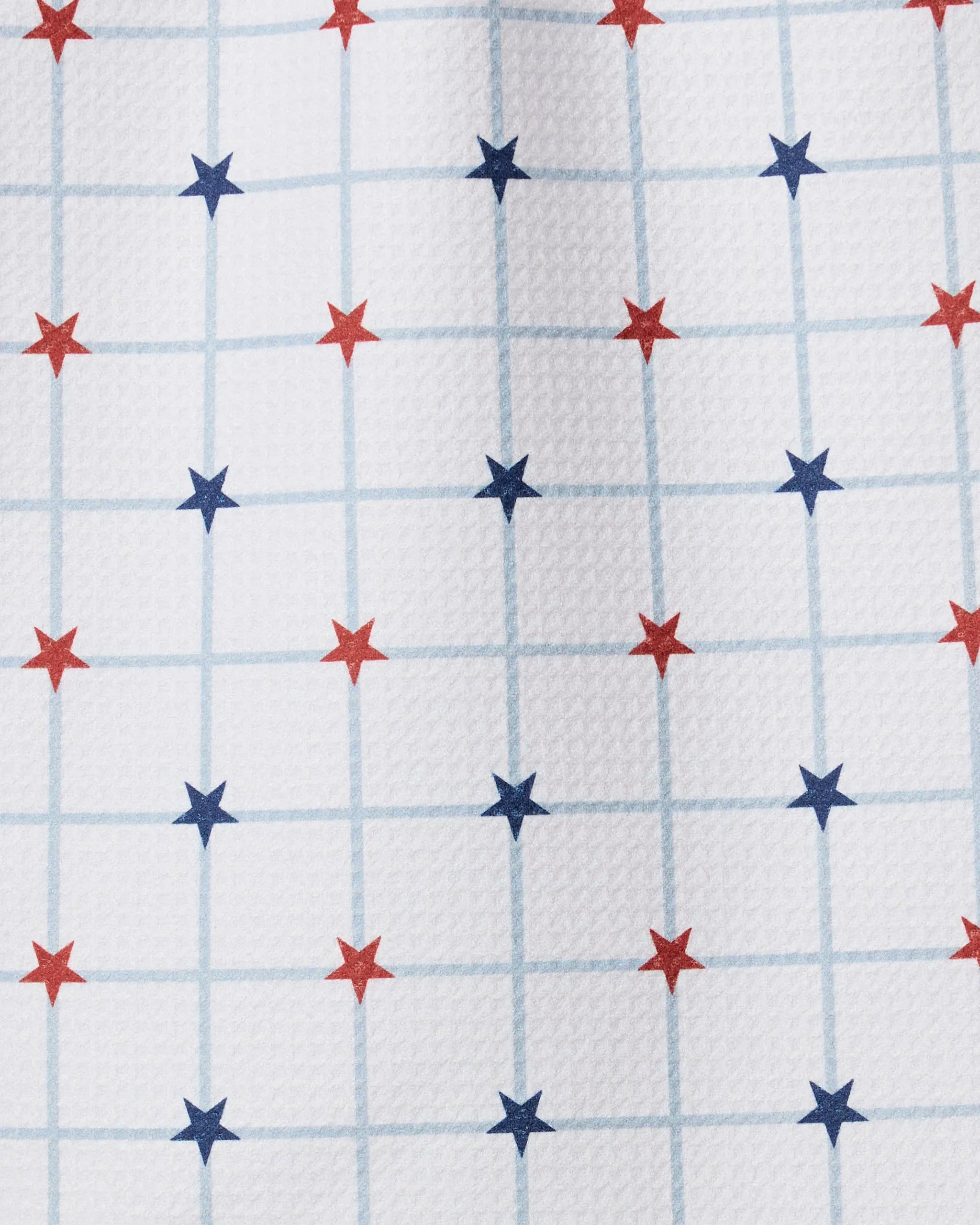 Geometry's Garden Stars features a white textured surface like a recycled kitchen towel, decorated with a light blue grid and red and blue stars at each intersection.