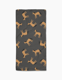 The Horses bar towel by Coit Creative features a dark gray rectangular design with a repeating pattern of stylized tan horses in various poses, made from eco-friendly Geoweave fabric using recycled materials.