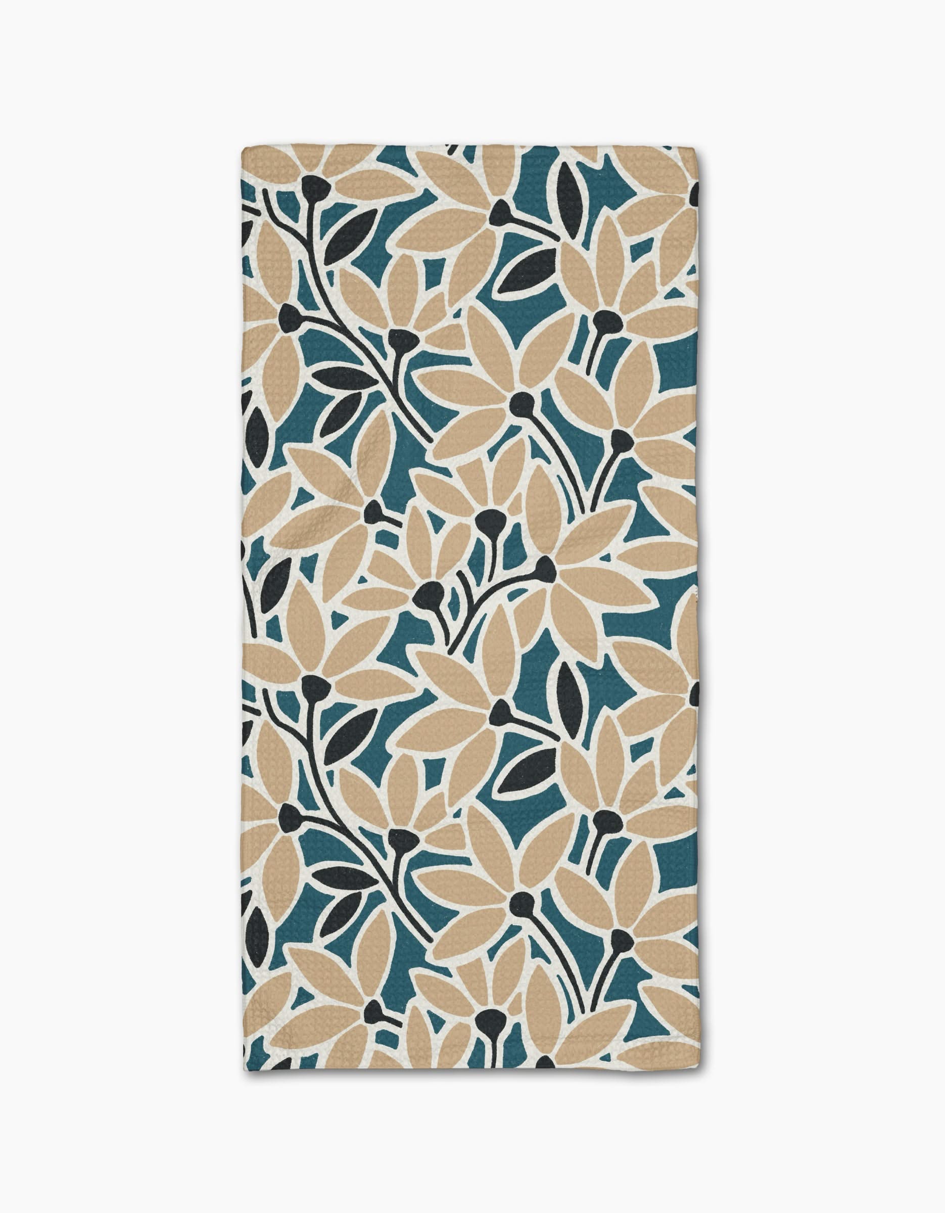 The Janine bar towel by Amy MacCready features a bold floral pattern with beige flowers, dark blue leaves, and a teal background. Made of ultra-absorbent Geoweave fabric for full-surface coverage and efficient drying.