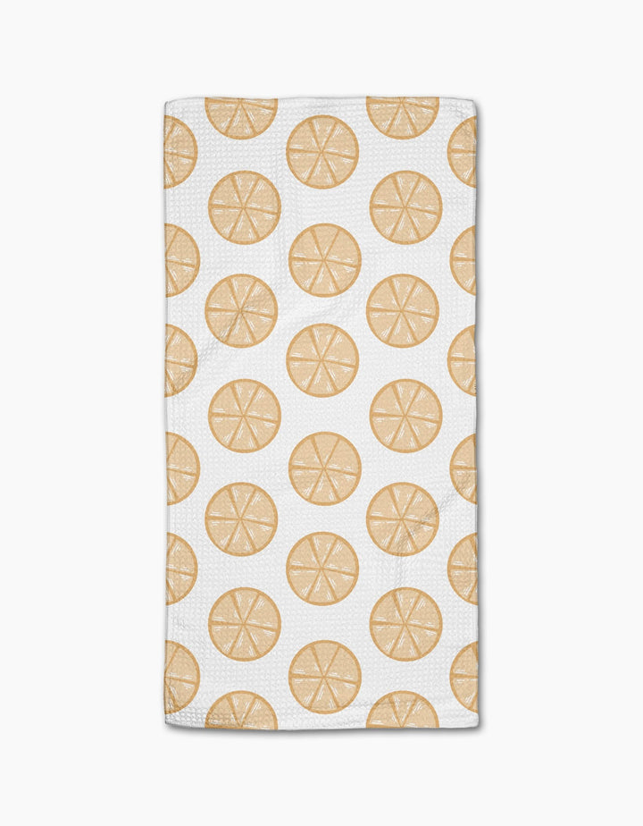 Lemon Doodles by Letters By Shells is a white rectangular, ultra-absorbent towel with a repeating pattern of lemon slice illustrations evenly spaced across the surface.
