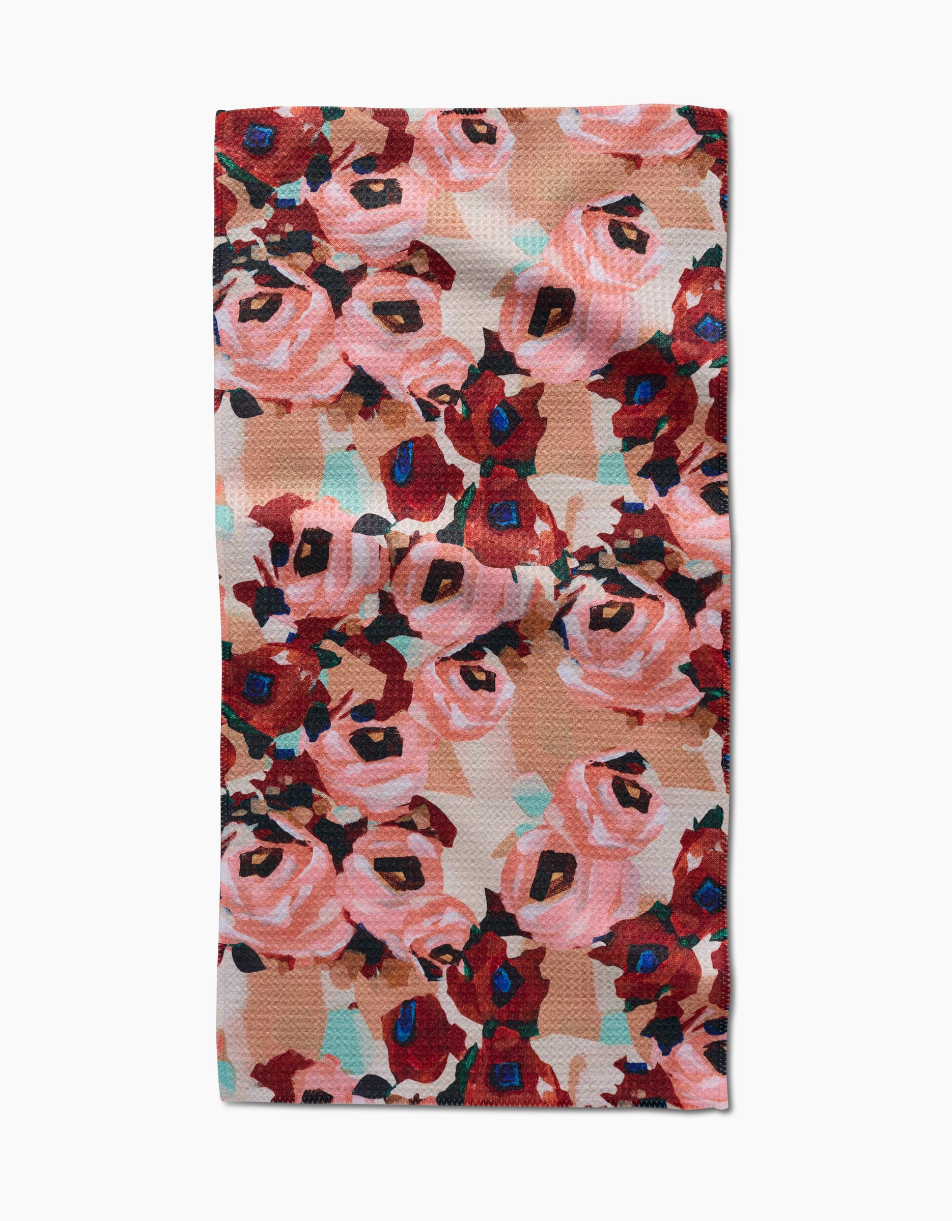The Lucia towel by Ania Zwara Art is rectangular and ultra-absorbent, featuring overlapping red, pink, and peach roses with teal and blue highlights on a beige background.