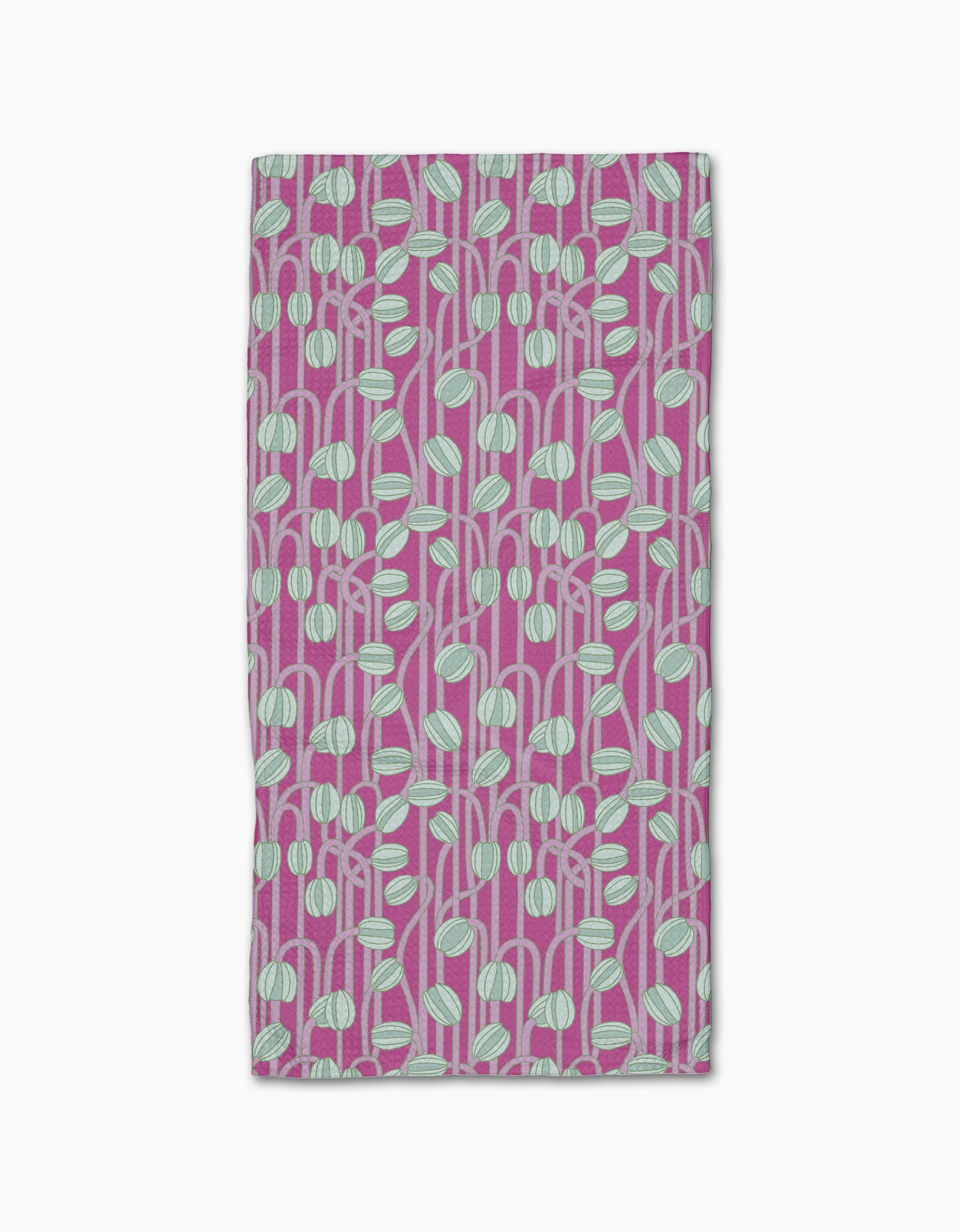 The Magenta Poppy Pods bar towel by Katie OShea is ultra-absorbent and rectangular, featuring a modern, botanical pattern of light blue and white rounded leaf shapes with stems on a magenta background.