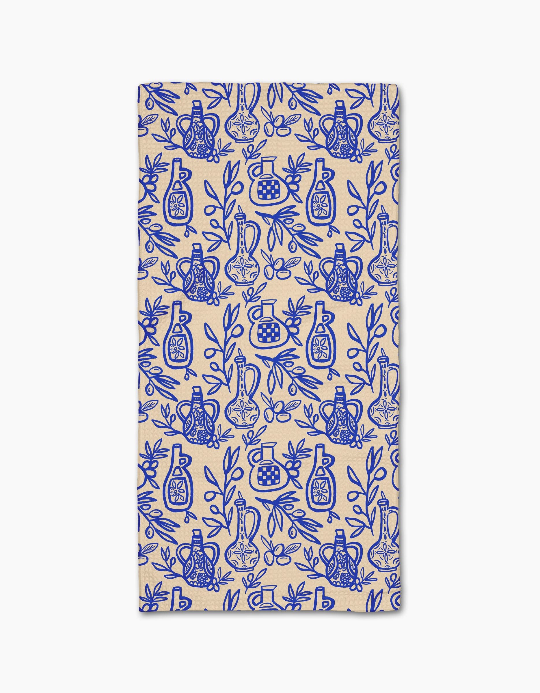 Lisa Nelsons Mediterranean Pour is a rectangular beige cloth napkin made from Geoweave fabric, featuring a blue pattern of stylized vases, jars, and leafy branches in a repeating design.