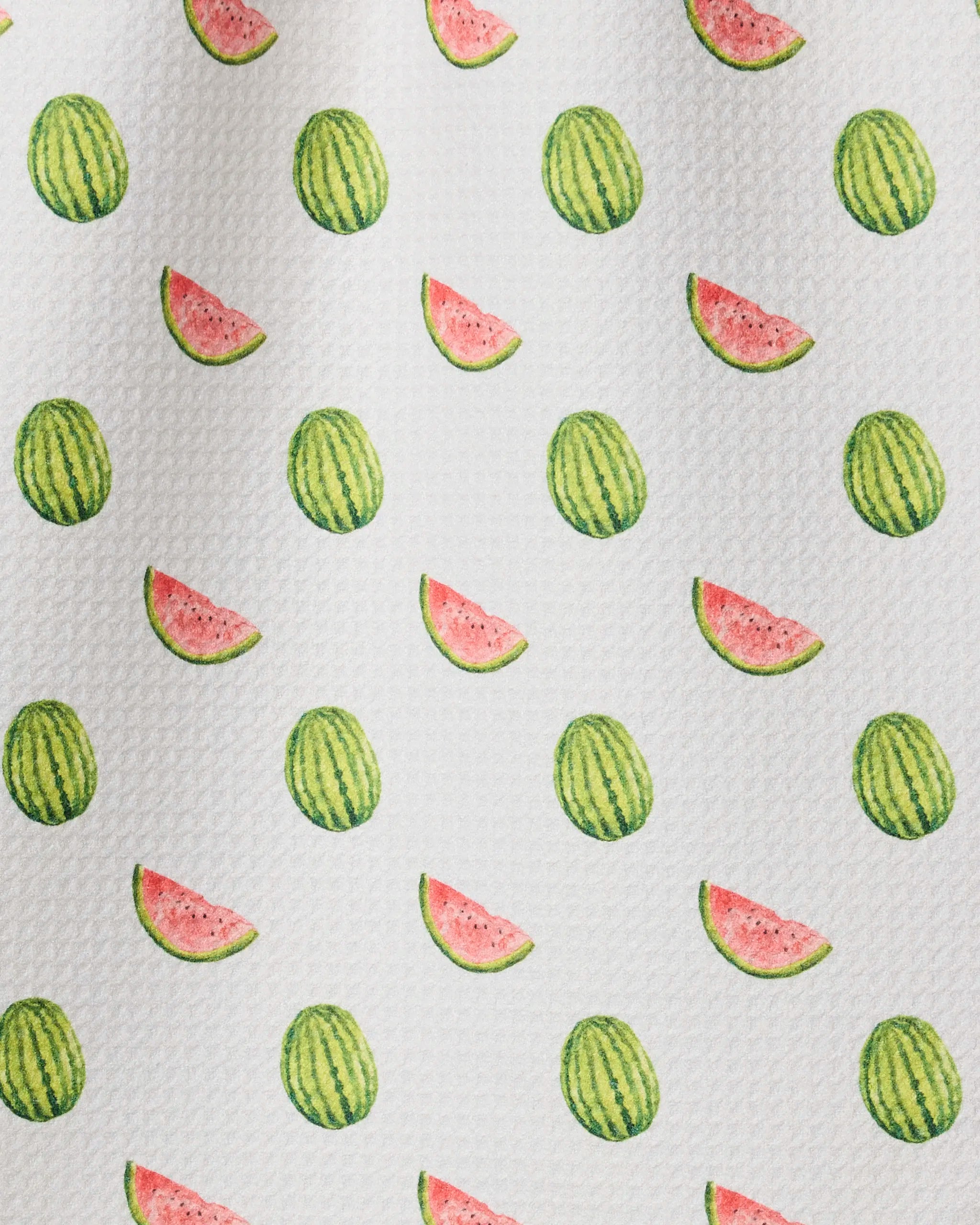 Melon Market Scattered by Geometry features hand-painted whole watermelons and slices in green and pink on textured white Geoweave fabric, arranged in diagonal rows—perfect for a vibrant bar towel.