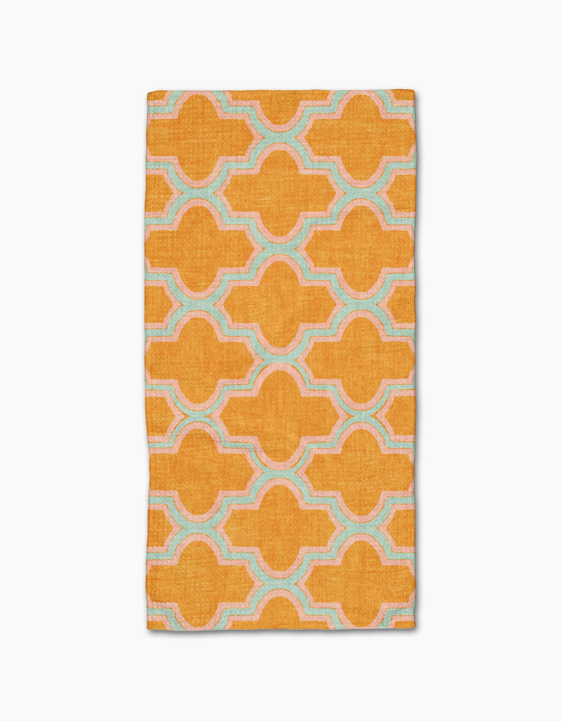 The Mustard Ogee by Pascale Dilger is a rectangular, ultra-absorbent towel featuring a bold orange geometric pattern with interconnected shapes outlined in light blue and white on a plain white background.