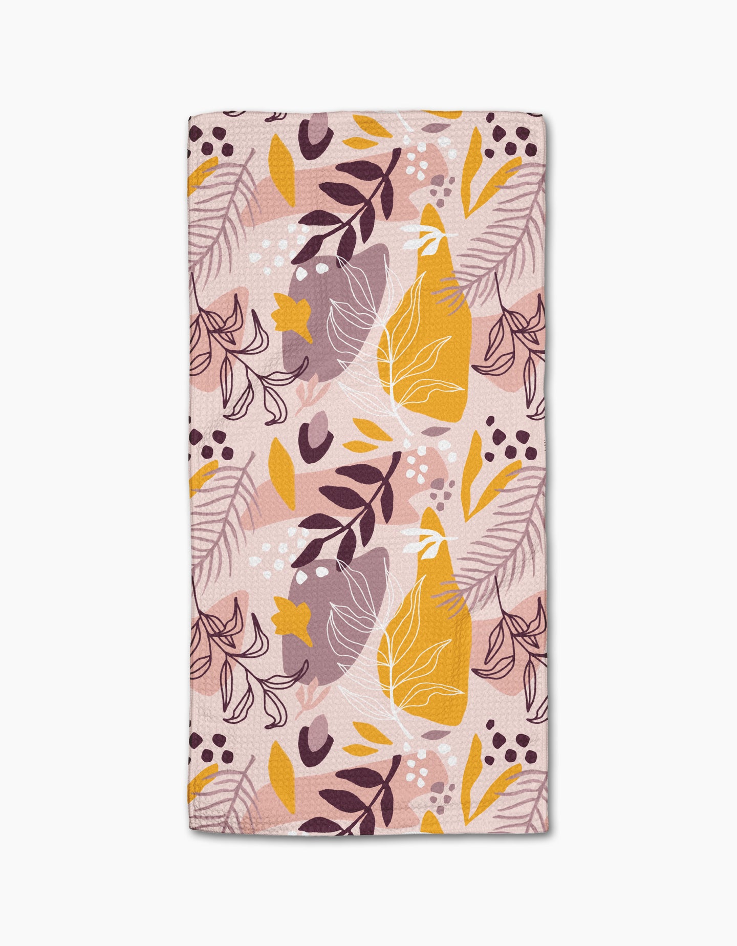 The Nature Sketch towel by Cottonflower Studio is a rectangular, ultra-absorbent bar towel with an abstract botanical design in pastel pink, yellow, purple, and white leaves on light pink—ideal as a stylish decorative accent.
