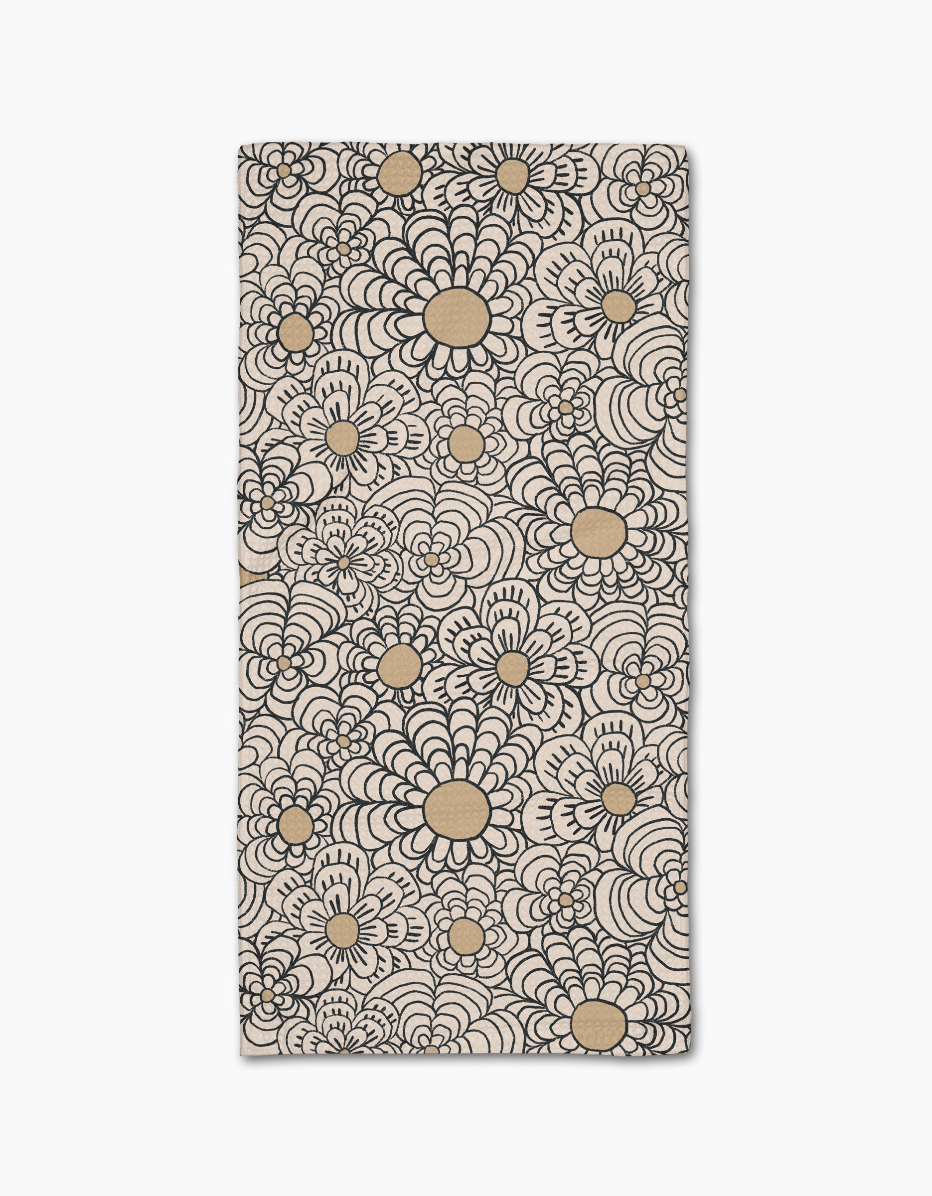The Paulette bar towel by Amy MacCready showcases a bold black and tan floral pattern with large, stylized flower shapes on ultra-absorbent beige Geoweave fabric covering the entire rectangular surface.