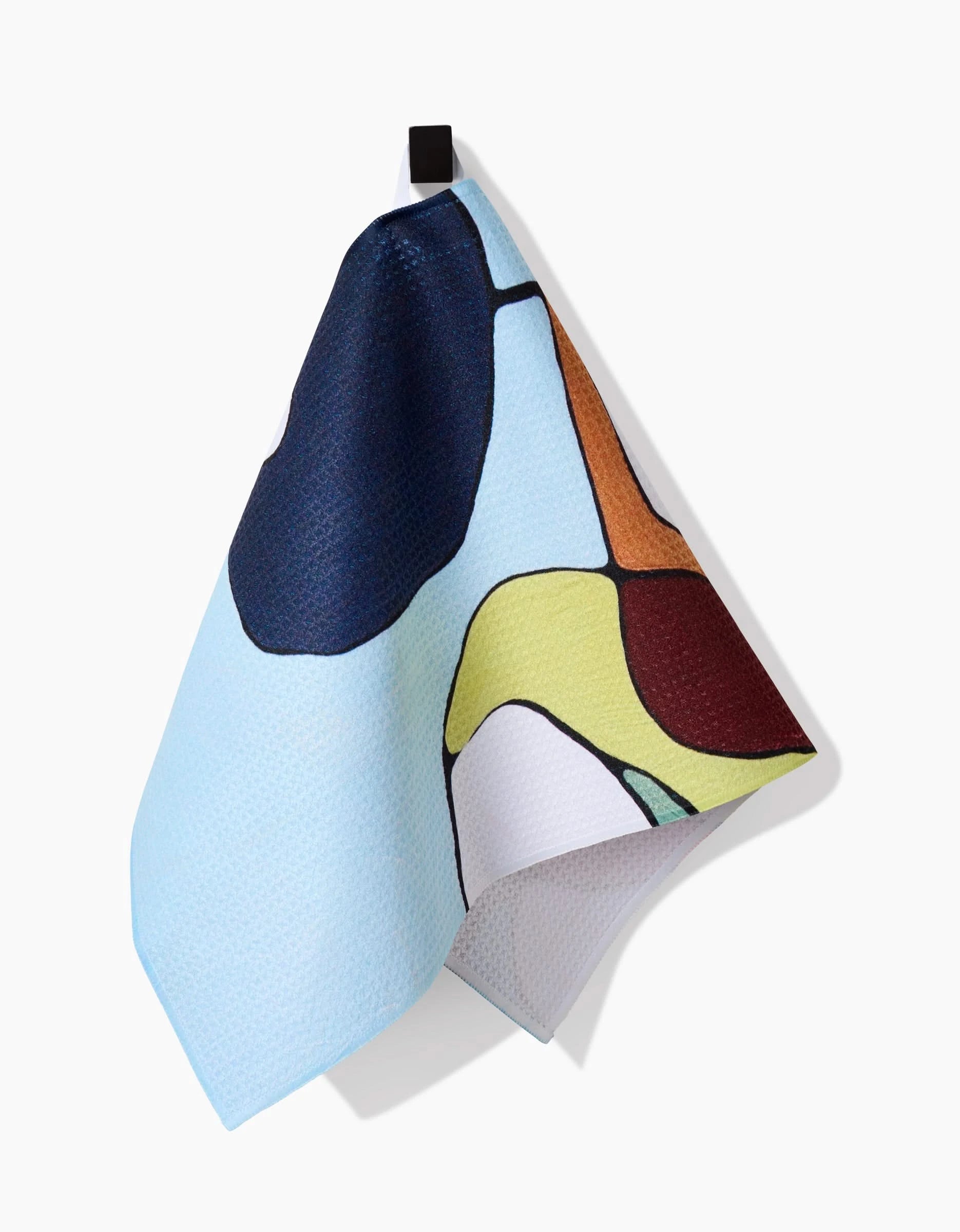 The Poppies on Blue Bar Towel by Rachel Austin features an abstract design in blue, yellow, brown, and light green on Geoweave fabric, shown hanging from a black loop against a white background.