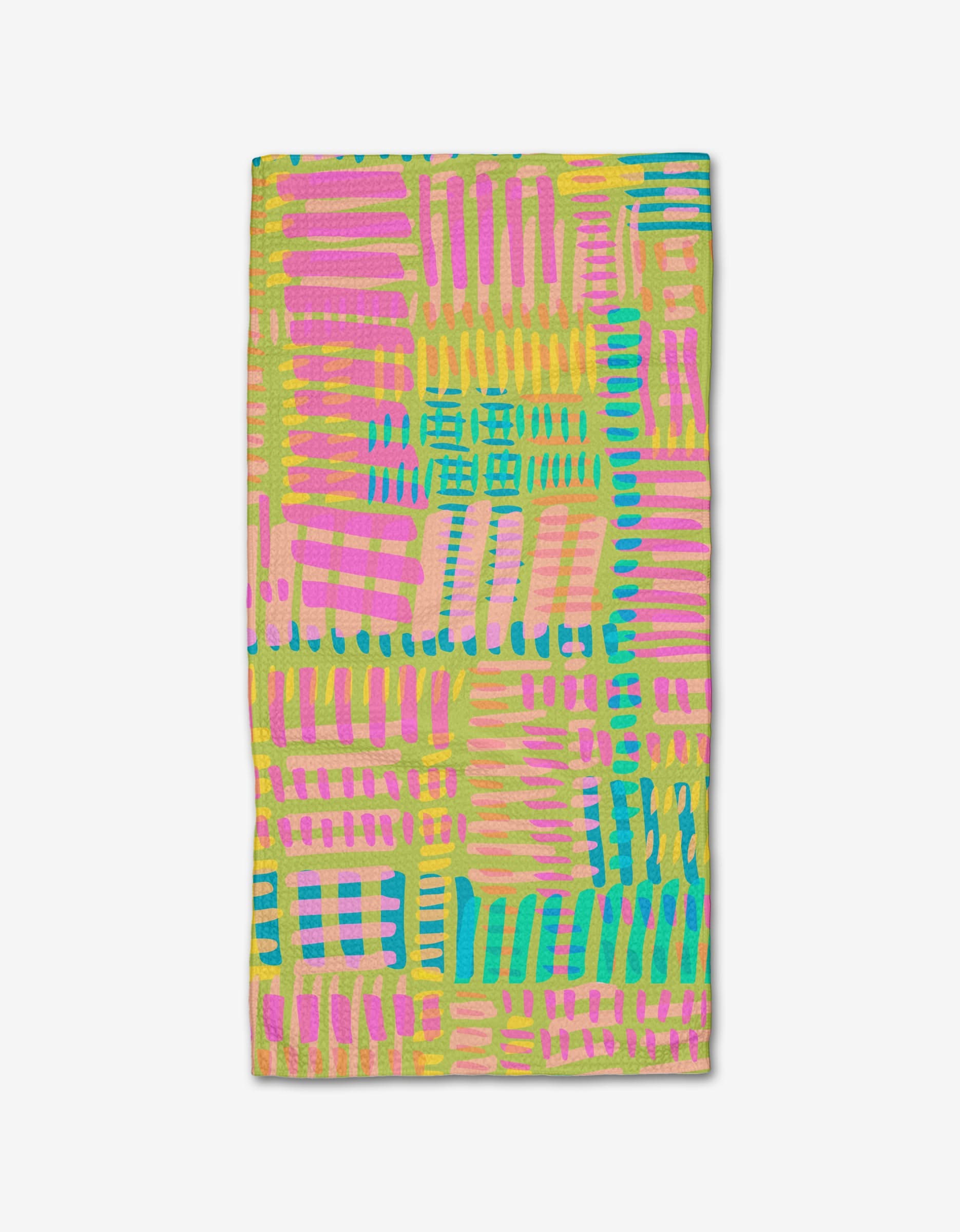 The Positive Vibes Bar Towel by Sareka Unique features vibrant pink, yellow, green, and blue intersecting lines on a light background. Made from ultra-absorbent Geoweave fabric, it creates a cheerful patchwork effect.
