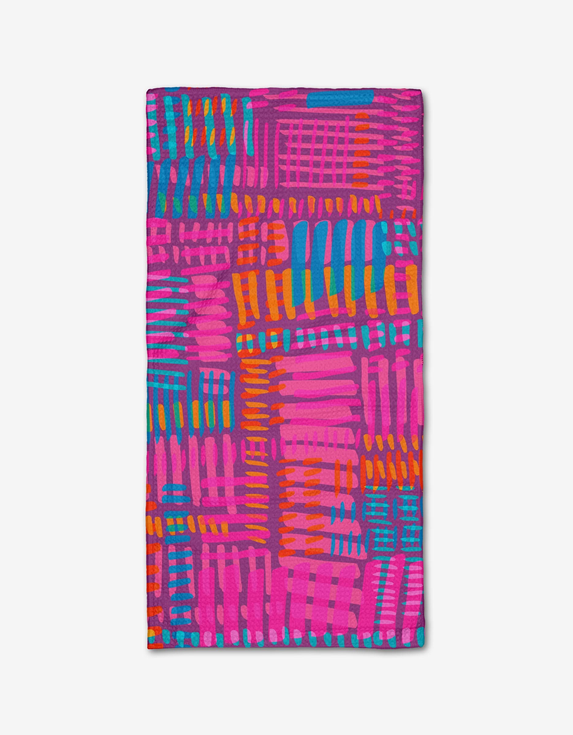 The Positive Vibration Bar Towel by Sareka Unique features a vibrant geometric pattern in pink, orange, blue, and purple on white Geoweave fabric, offering quick-drying performance and a soft feel.