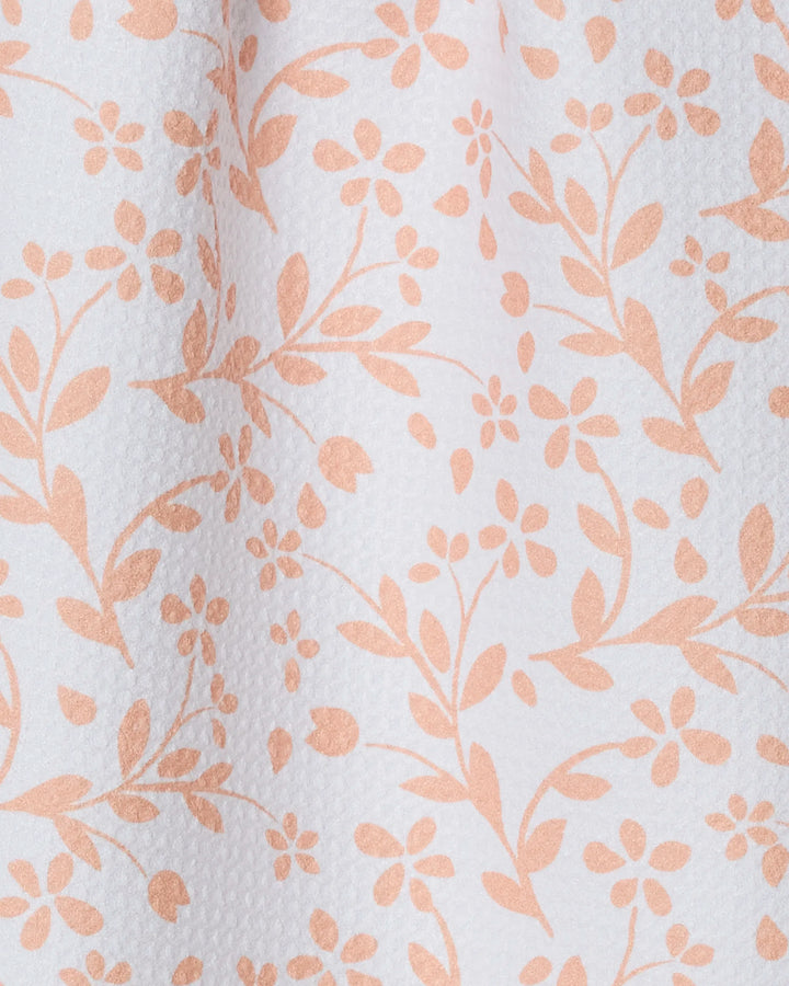 A close-up of the Quiet Floral towel by Geometry highlights its ultra-absorbent texture, crafted from recycled materials.
