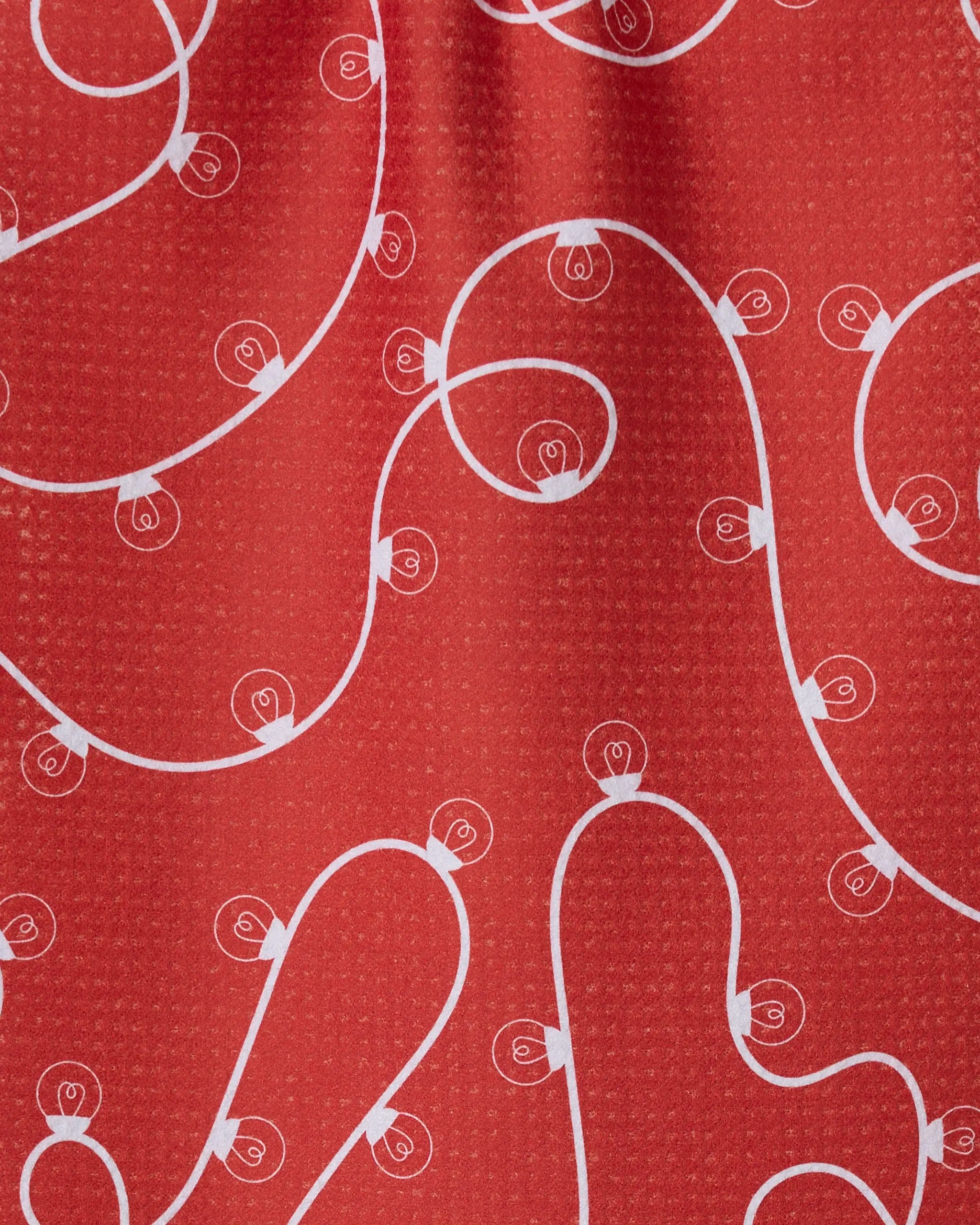 The Geometry Red Holiday Lights kitchen towel features a festive white string light and bulb design on quick-drying, dotted red recycled fabric—perfect as a holiday bar towel.