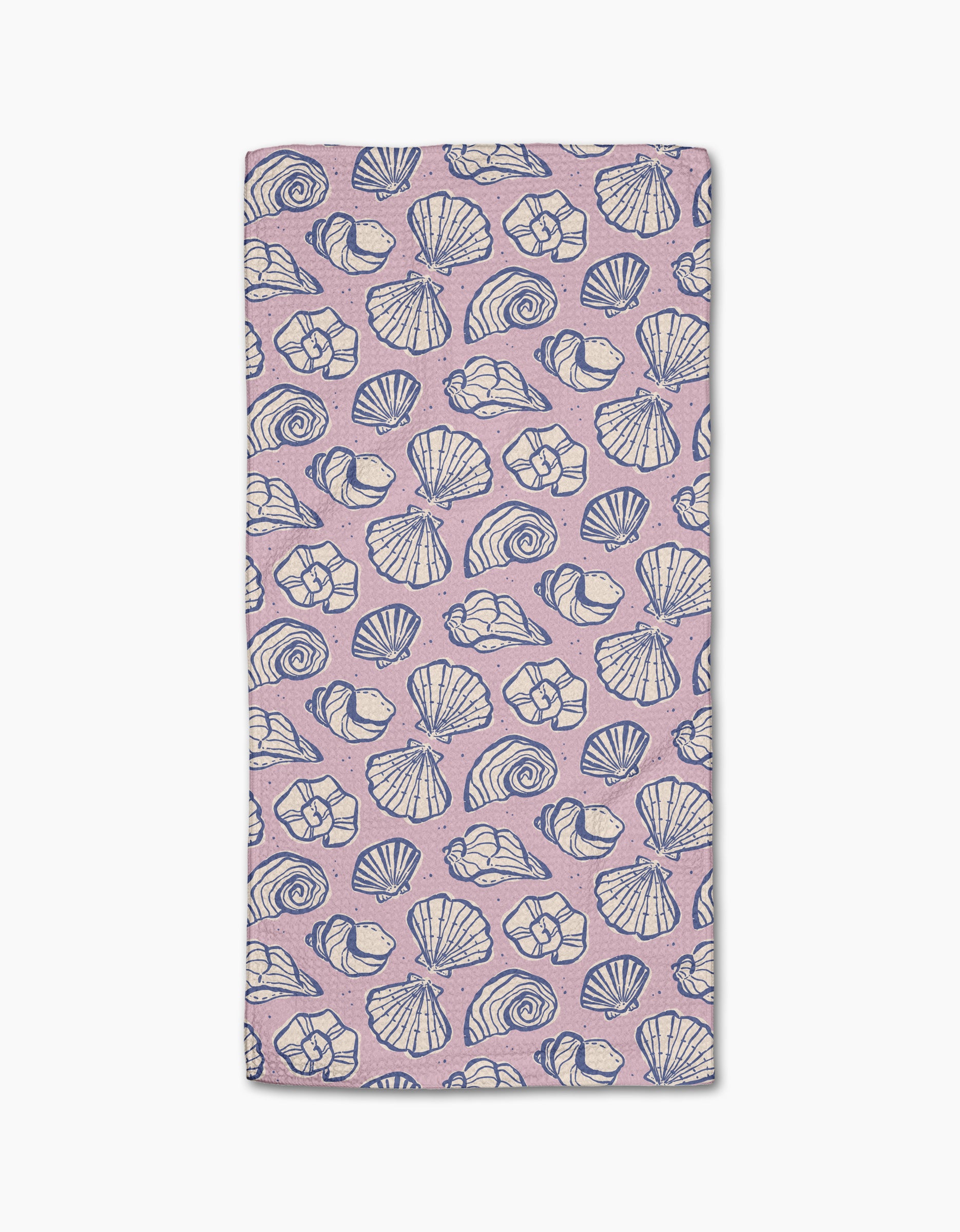 The Retro Coastal Seashells in Pink towel by Teri the Butter is a rectangular, light pink ultra-absorbent towel with blue and white seashell patterns on a white background.