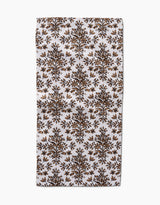 The Rustic Lacy Tile Natural by Hufton Studio is a rectangular white recycled kitchen towel with a repeating brown and gold botanical pattern of symmetrical tree motifs arranged in rows.