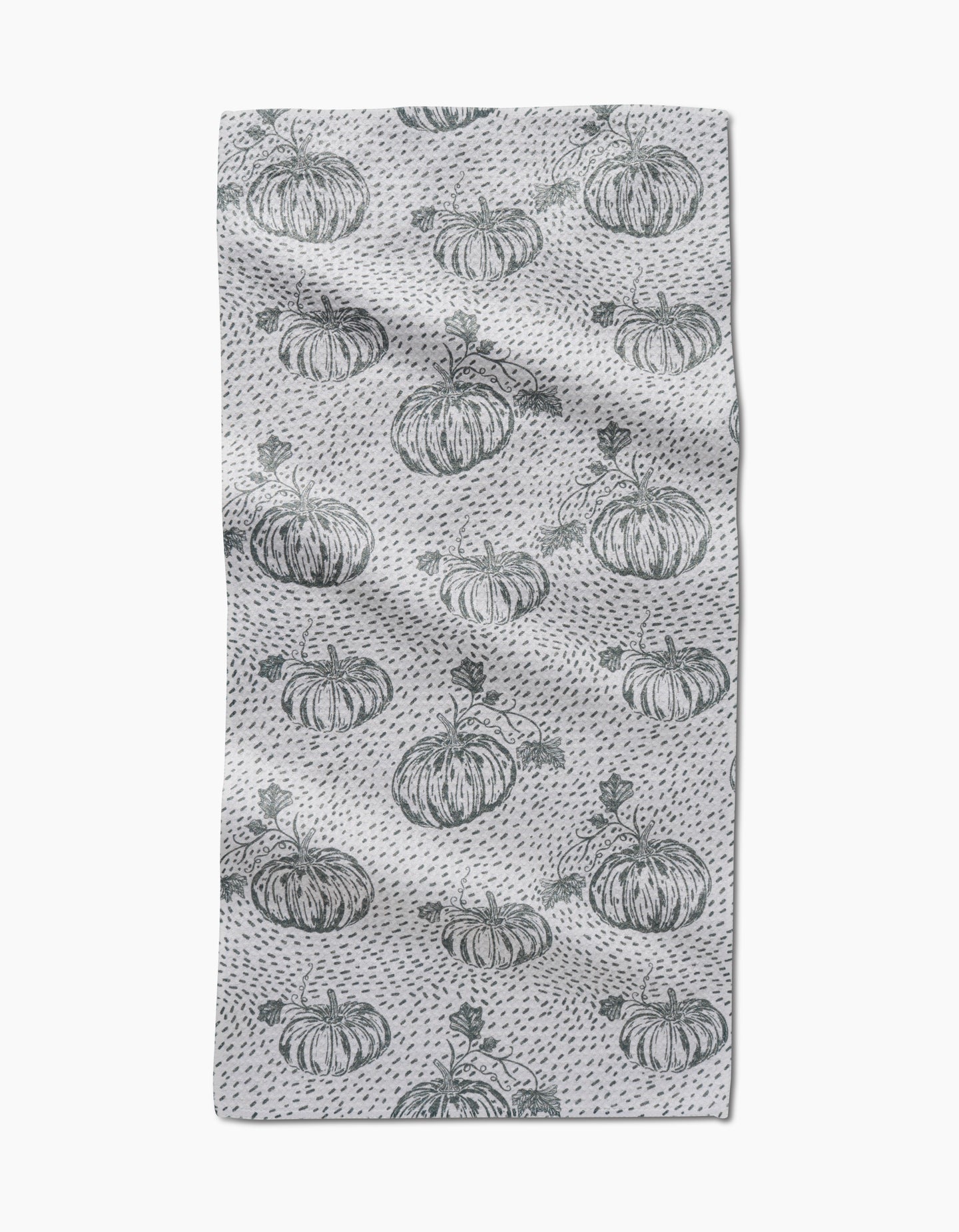 The Sage Pumpkin Field bar towel by Charlie Rowan Designs features hand-drawn pumpkins and dark gray dots evenly spaced across Geoweave fabric, creating a charming pattern on a slightly textured surface.