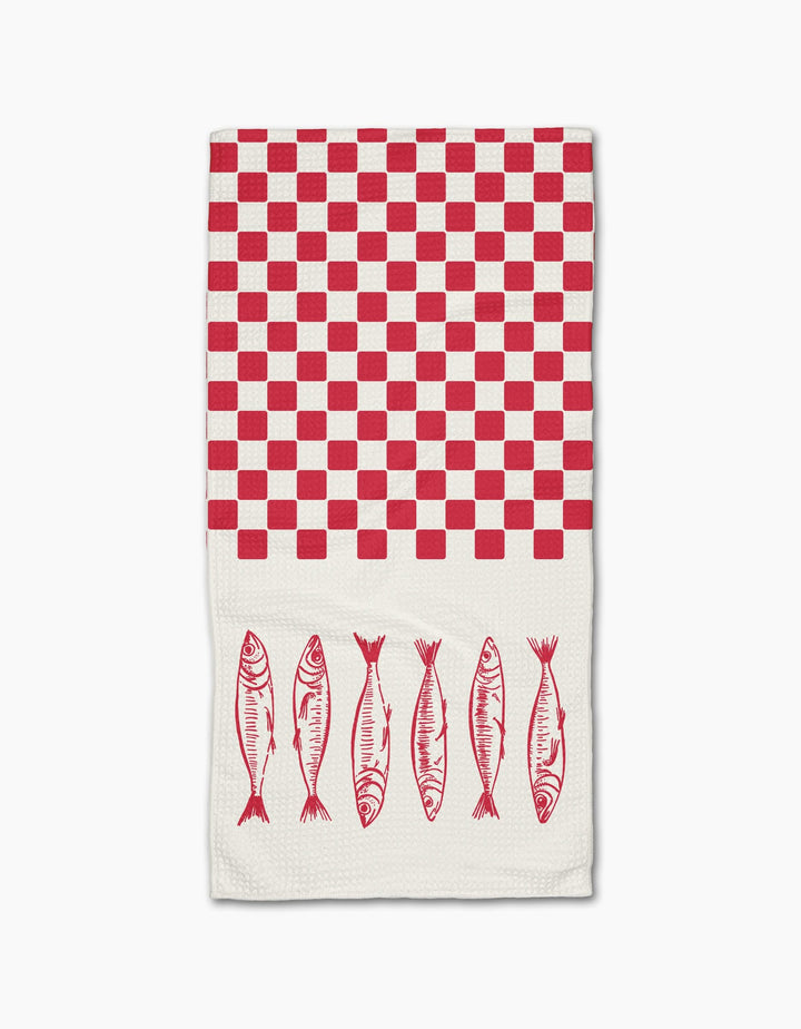 The Sardine Check by Hufton Studio is a white Geoweave bar towel with a red checkerboard on the top half and six red sardine fish lined up near the bottom.