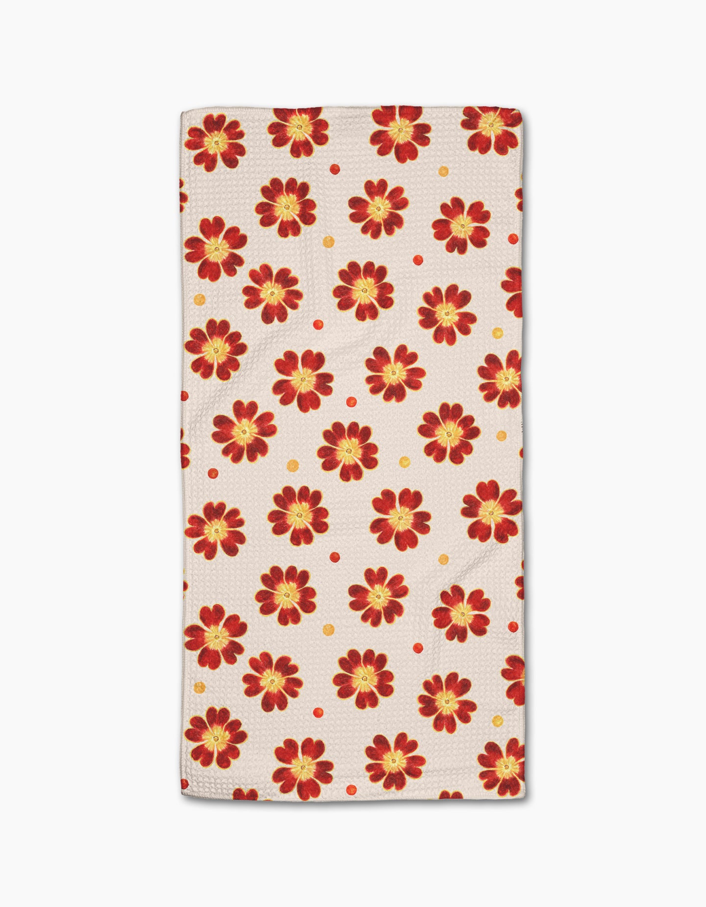 Spotty Floral by Linda Fox is a rectangular beige towel with ultra-absorbency, decorated with red and yellow floral patterns and scattered small red and yellow dots.