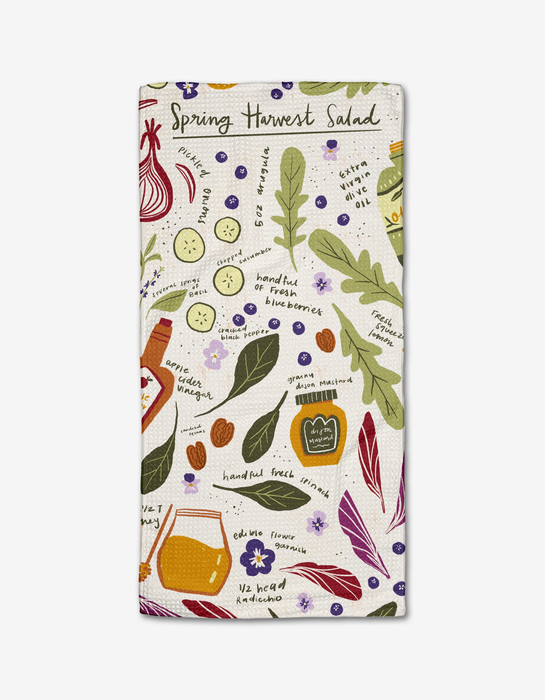 The Spring Harvest Salad tea towel by Janna Sue Design features vibrant Geoweave fabric with colorful illustrations of spring salad ingredients and the product name at the top—a lively addition to your kitchen.