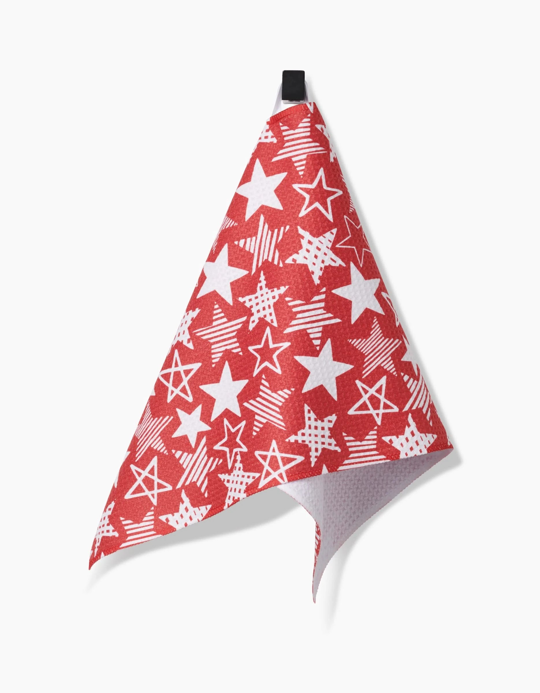 The Stars In Your Eyes Red bar towel by Hufton Studio, made from durable Geoweave fabric, features white stars on red and hangs from a black loop. Its folded corner exposes the white underside against a plain white background.