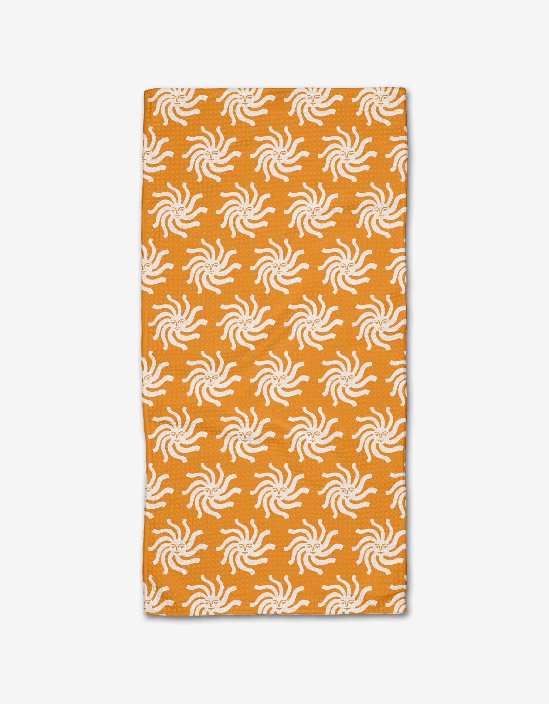 The Kayla Ann Sunshine Smile bar towel is a rectangular orange towel made from Geoweave fabric, featuring an evenly spaced repeating pattern of white sun-like shapes, shown on a plain white background.