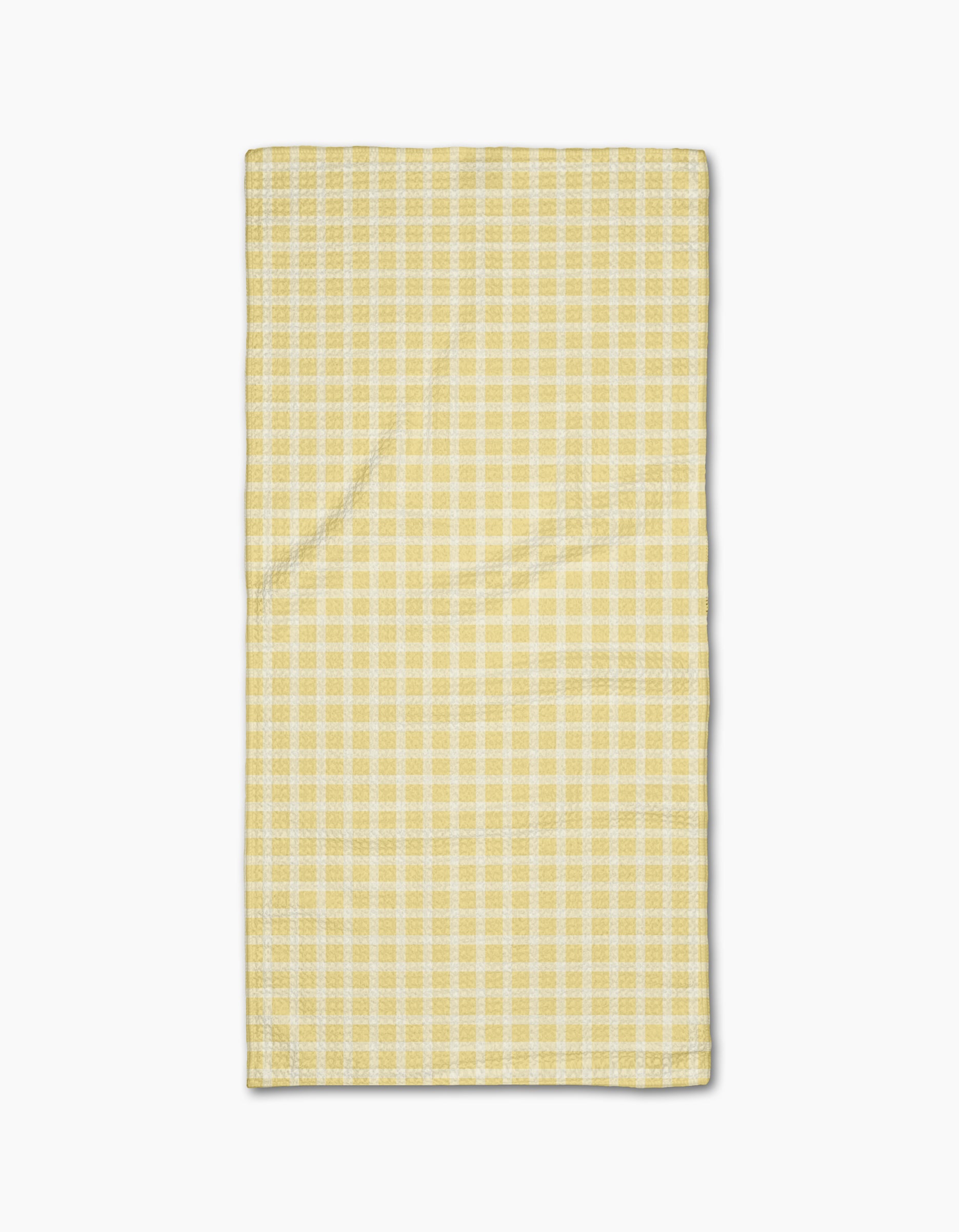 The GEOMETRY Sunspread Bar Towel, featuring a rectangular yellow and white checkered design in Geoweave fabric, is laid flat on a white background.