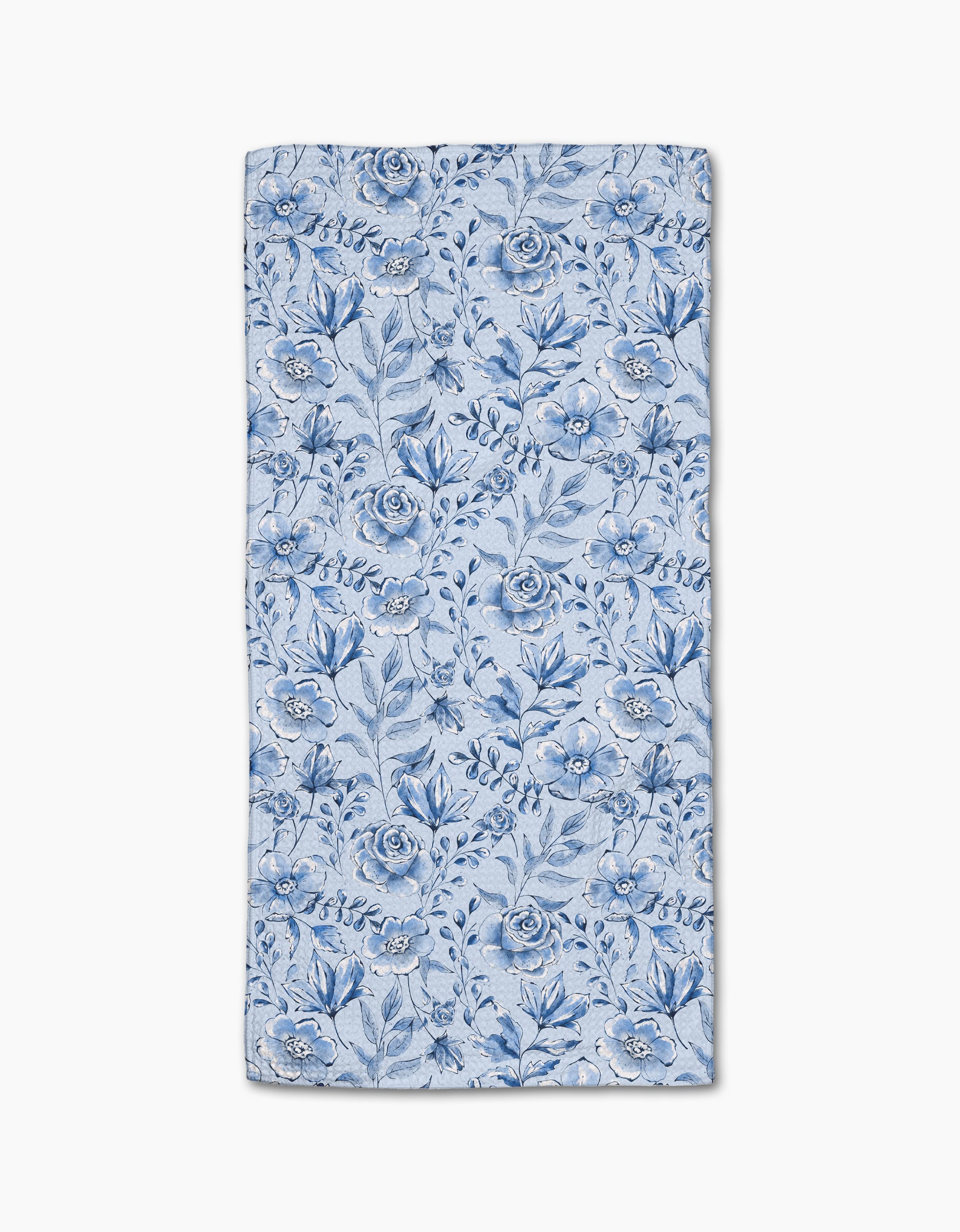 The Sara Mari Tea Set Blossoms bar towel features a blue floral pattern with various flowers and leaves on a light blue Geoweave fabric, shown flat against a white background.