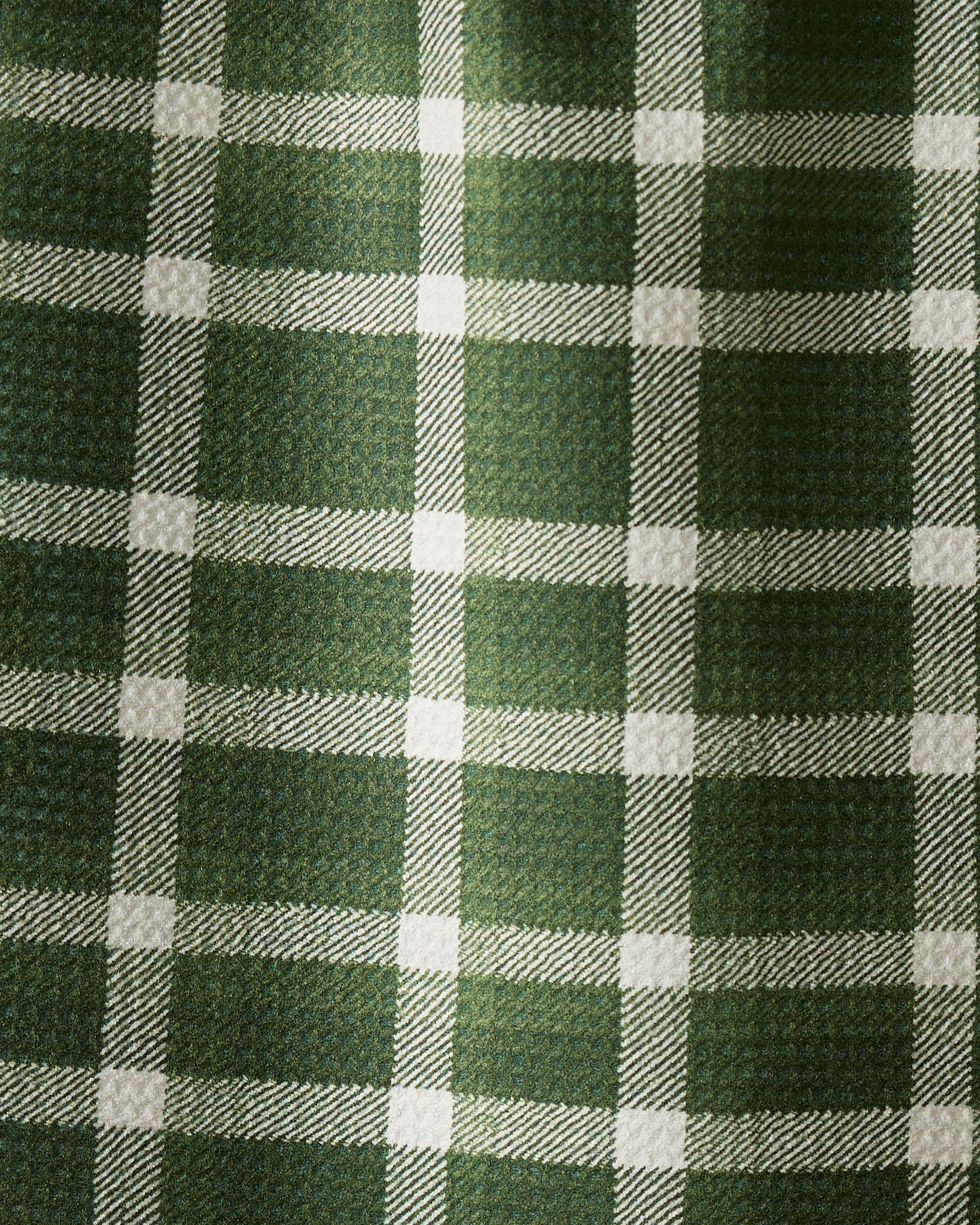 The Wicklow Green kitchen towel by Geometry features a green and white plaid with diagonal twill texture—ultra-absorbent and ideal for everyday use.