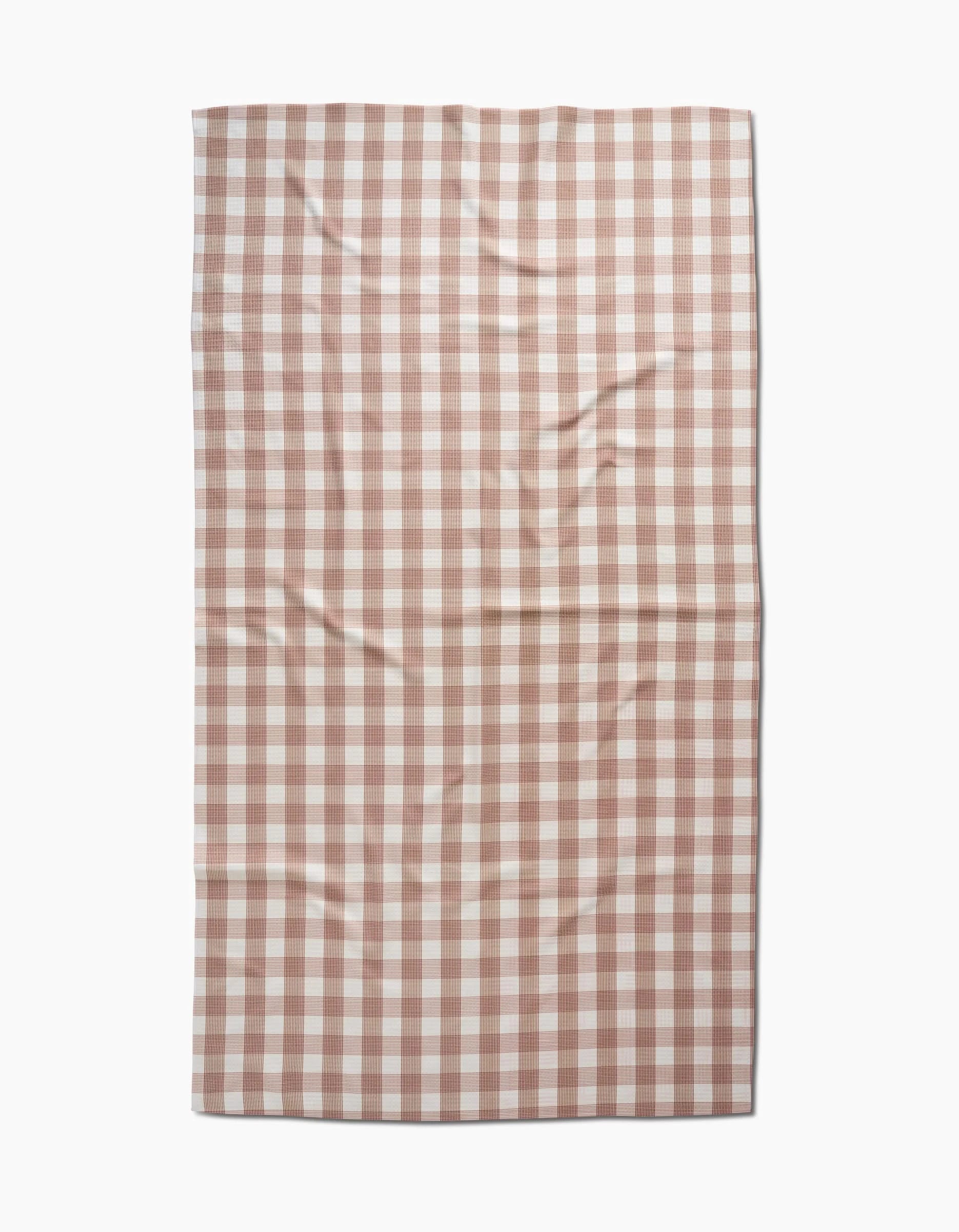 The Hufton Studio Vintage Gingham Natural is a rectangular Luxe Bath Towel in a brown and white checkered pattern, crafted from ultra-absorbent recycled materials and shown laid flat with visible creases.