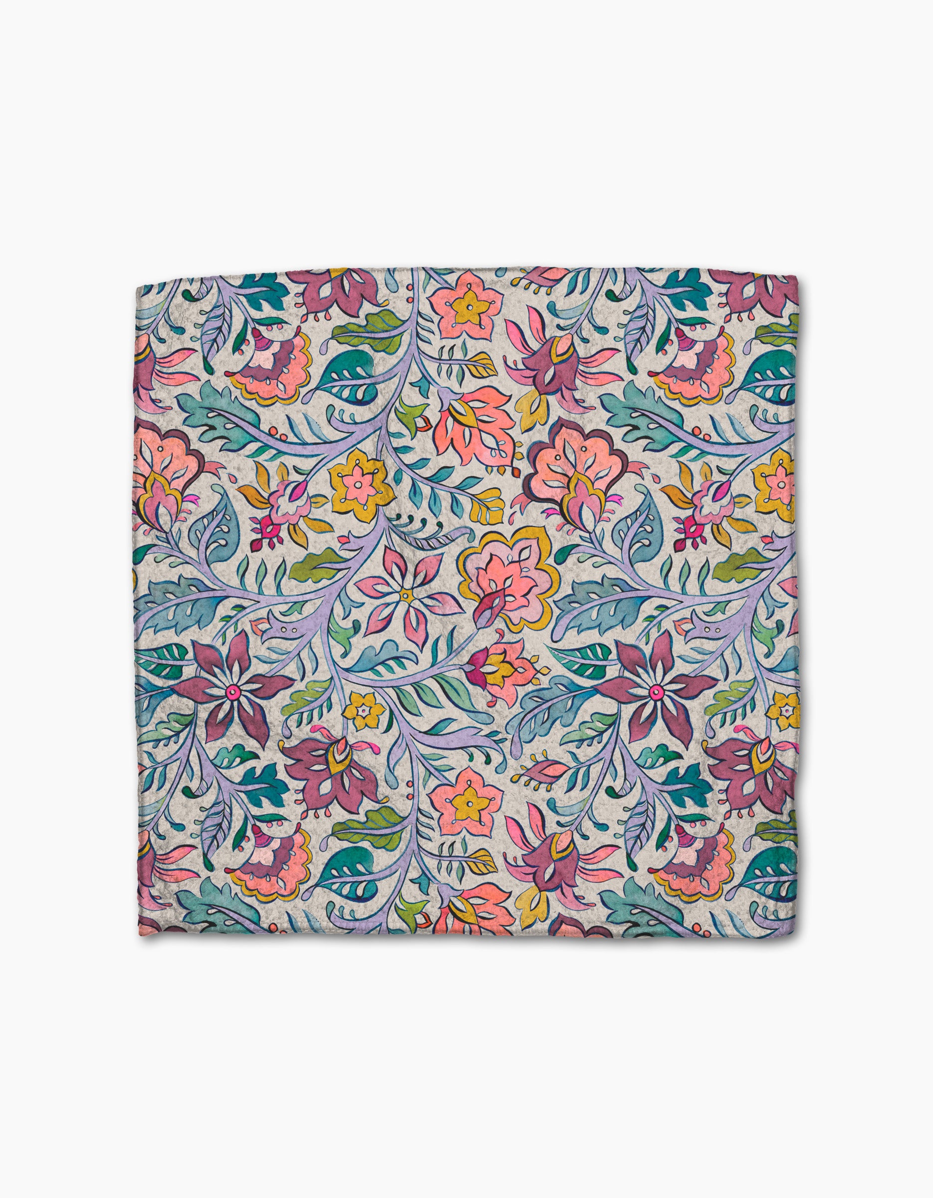 Amethyst by Maayan Alper-Swan is a folded square cloth with a vibrant floral pattern in pink, yellow, purple, and green on a light background, made from recycled materials.