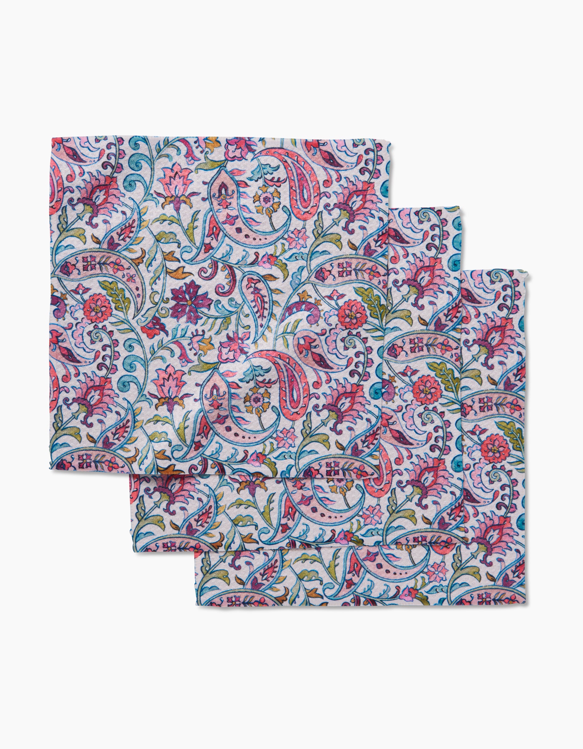 Bazaar by Maayan Alper-Swan: Set of three square cloth napkins made from recycled materials, featuring an intricate floral and paisley pattern in pink, blue, green, and red on a white background.