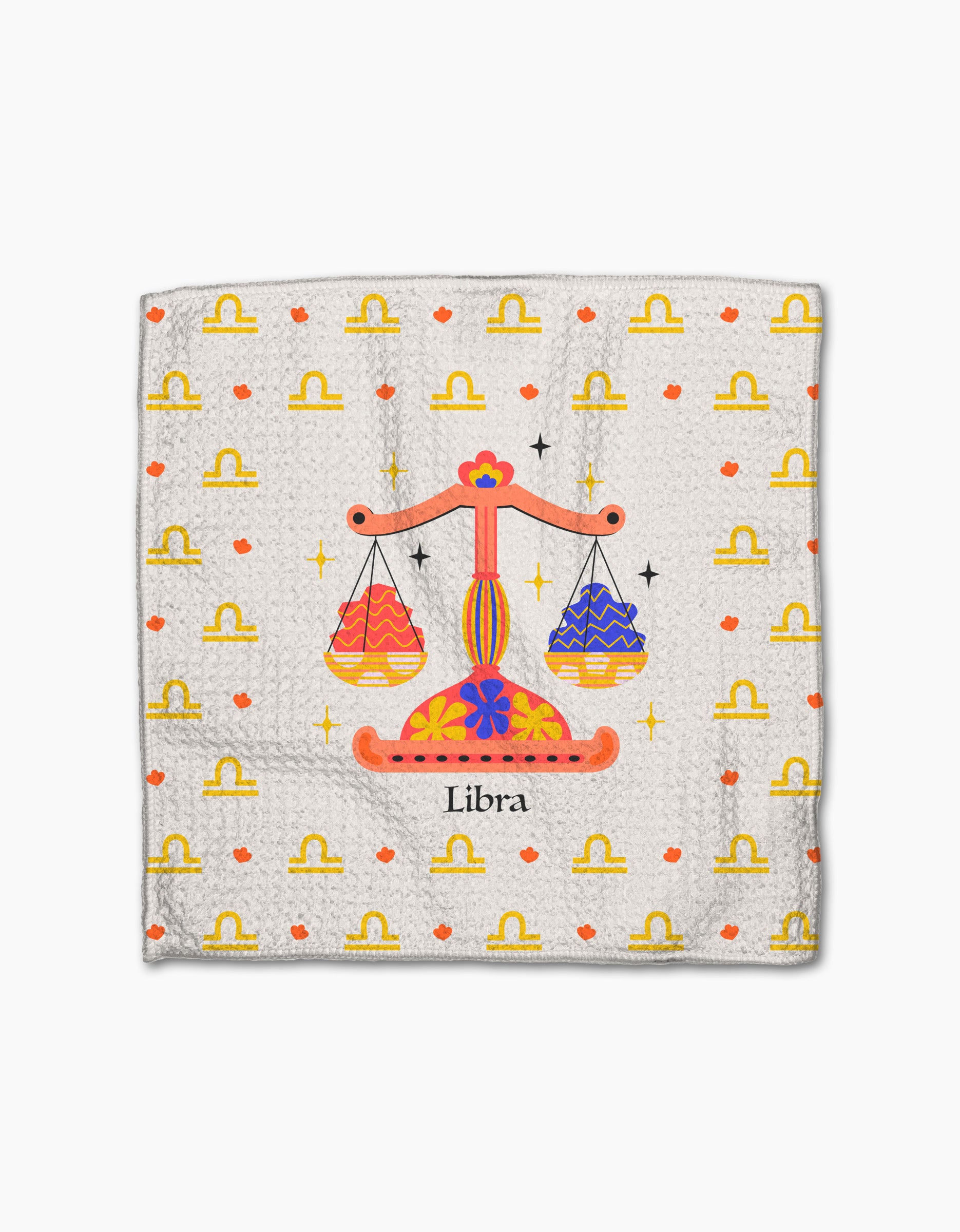 The Charming Libra dishtowel by Heather Zhou features an orange and yellow Libra scale, tiny hearts and zodiac symbols in the background, and "Libra" printed below the scale.