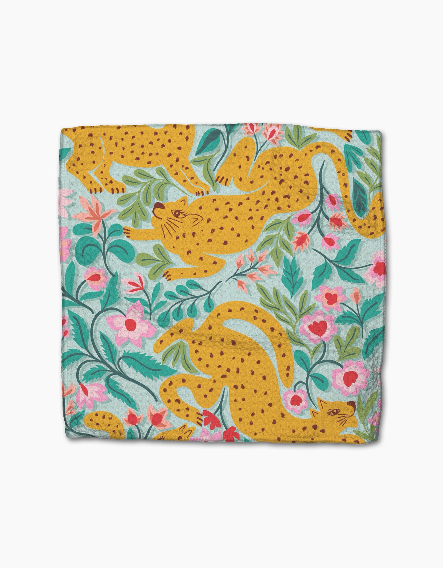 Cheetah Haven by Jasmine Blooms Designs is a colorful dishcloth set made from recycled materials, featuring yellow cheetahs with spots among green leaves and pink flowers on a light blue background.