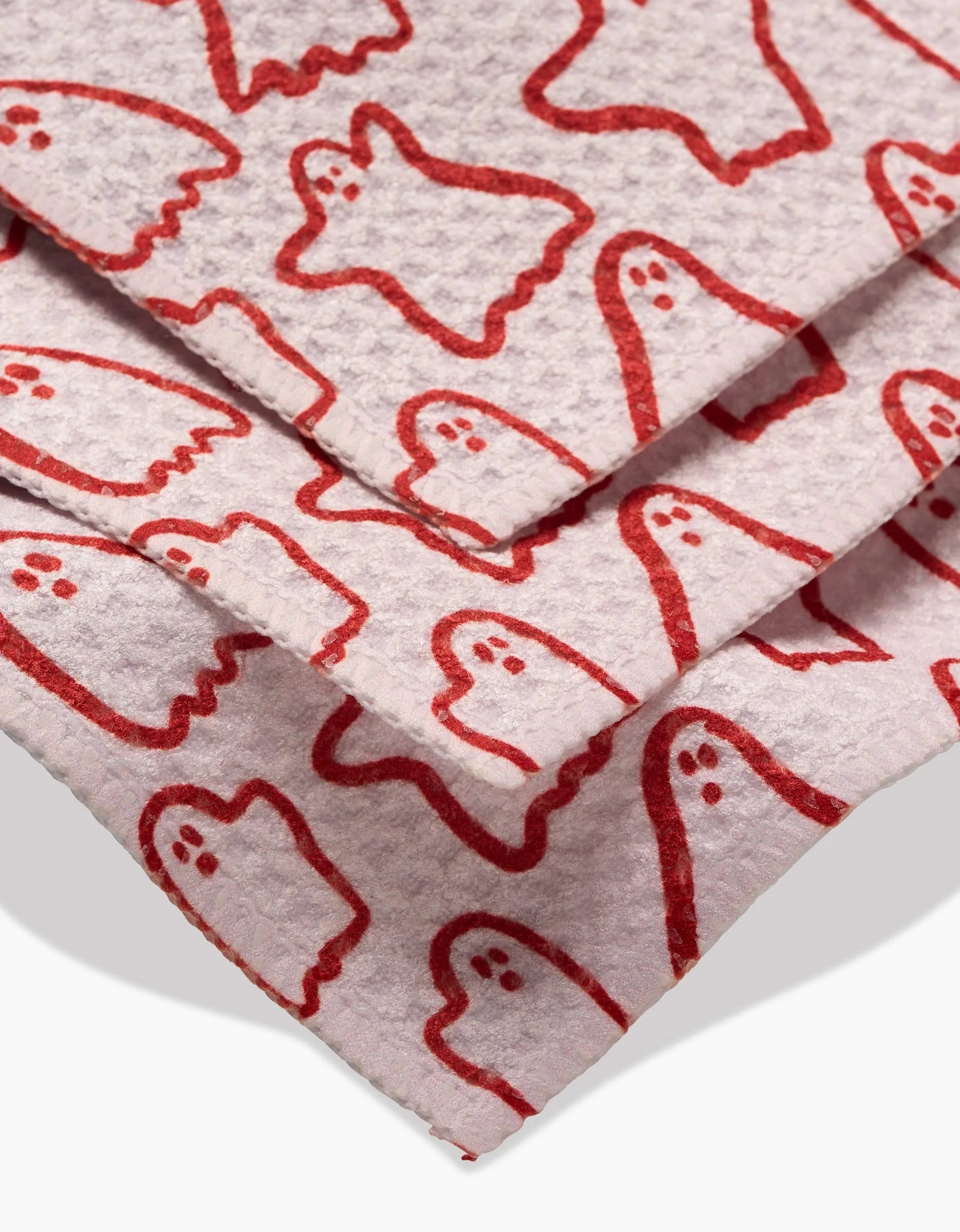 The Kayla Ann Cute Ghosts set includes three recycled dishcloths with playful red ghost designs—each with eyes and a mouth—adding a whimsical, eco-friendly accent to your kitchen.