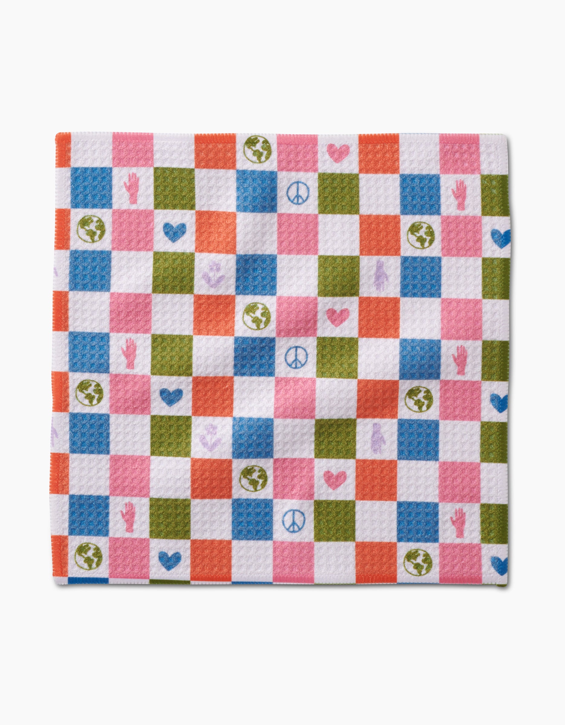 The Kayla Ann Earth Day Checkers dishcloth features a square shape and checkered pattern in orange, pink, green, blue, and white Geoweave fabric with peace signs, hearts, earth globes, and handprints on select squares.