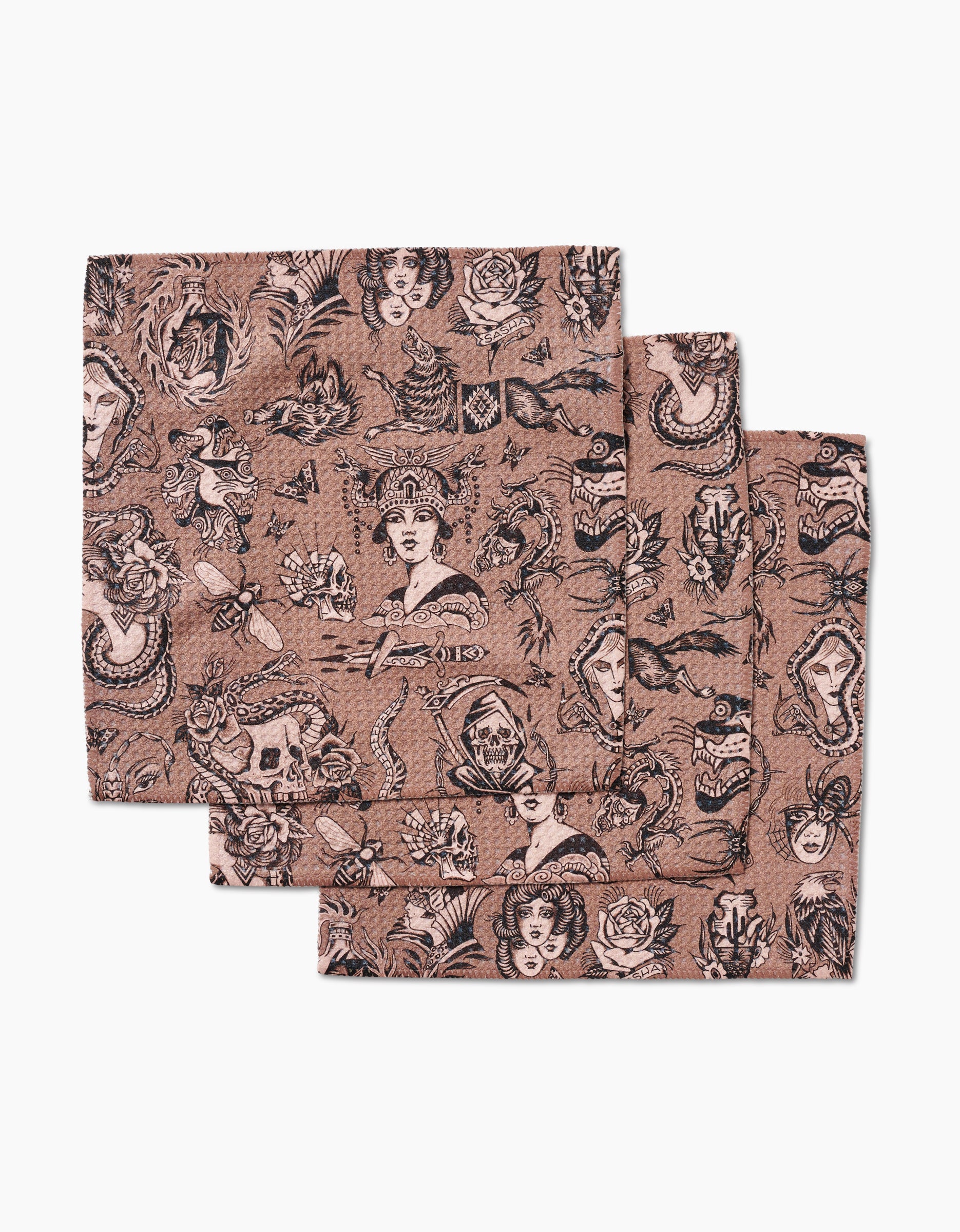 Three Flash handkerchiefs by Cole Strem in pinkish-brown Geoweave fabric feature black vintage tattoo-style art—women’s faces, roses, snakes, skulls, birds, and dice—and are displayed slightly overlapping on a white background.