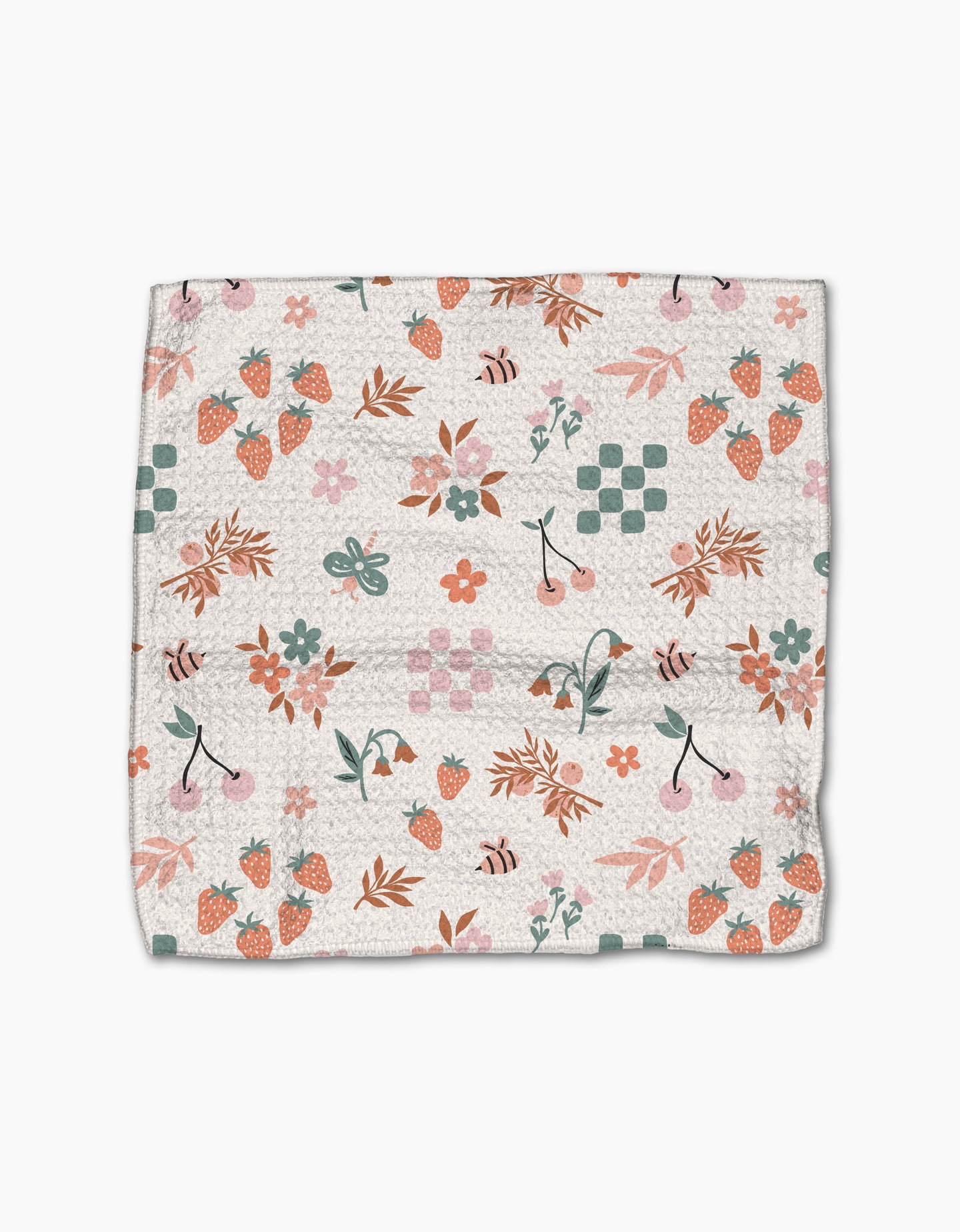 The Flower Patch dishcloth set by Charlie Rowan Designs features a folded eco-friendly Geoweave fabric with strawberries, cherries, bees, leaves, flowers, and green checkerboard patterns on a white background.