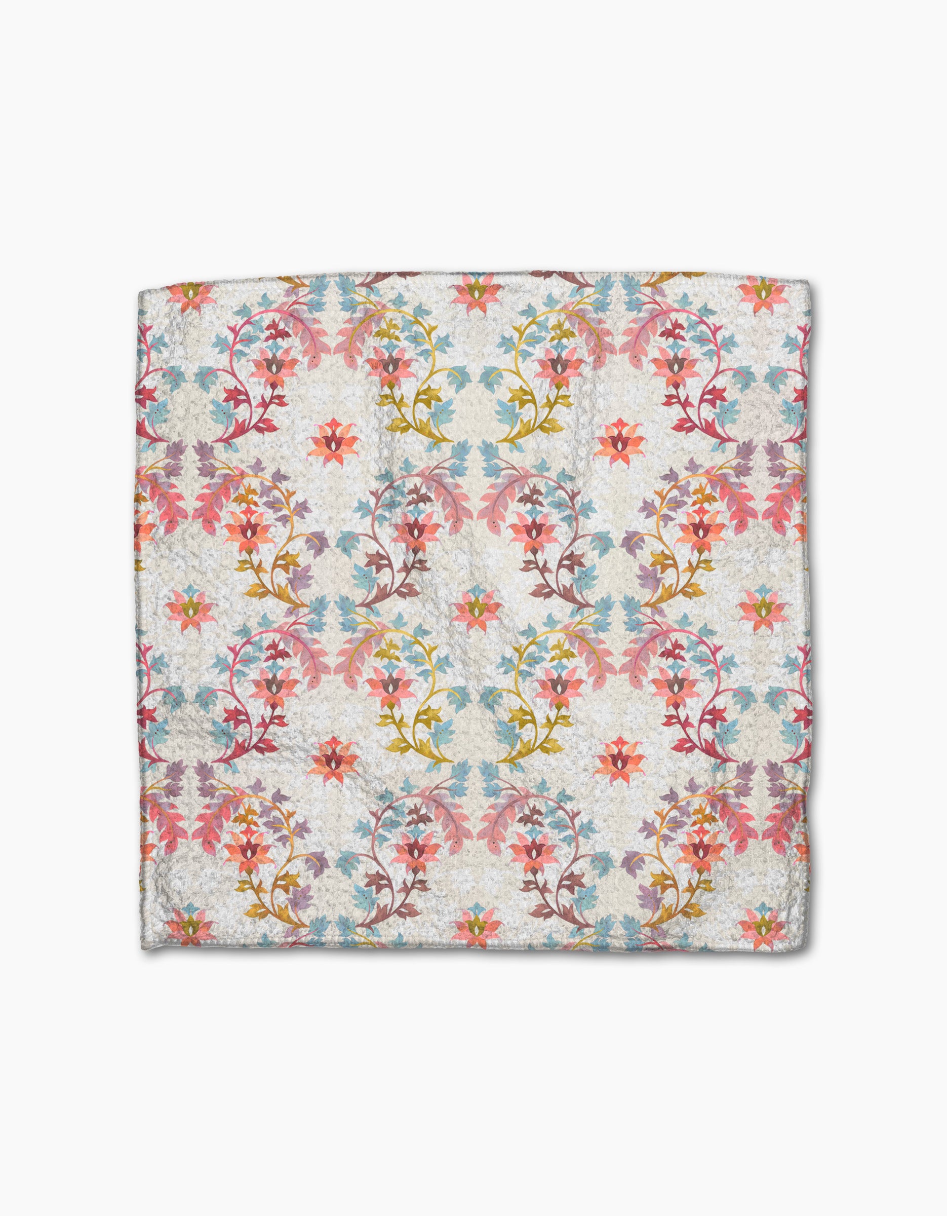 The Folk Medallion dishcloth set by Maayan Alper-Swan is made from recycled fabric and features a vibrant floral pattern in red, pink, yellow, blue, and green, with intertwining leaves and flowers in horizontal rows on a light background.