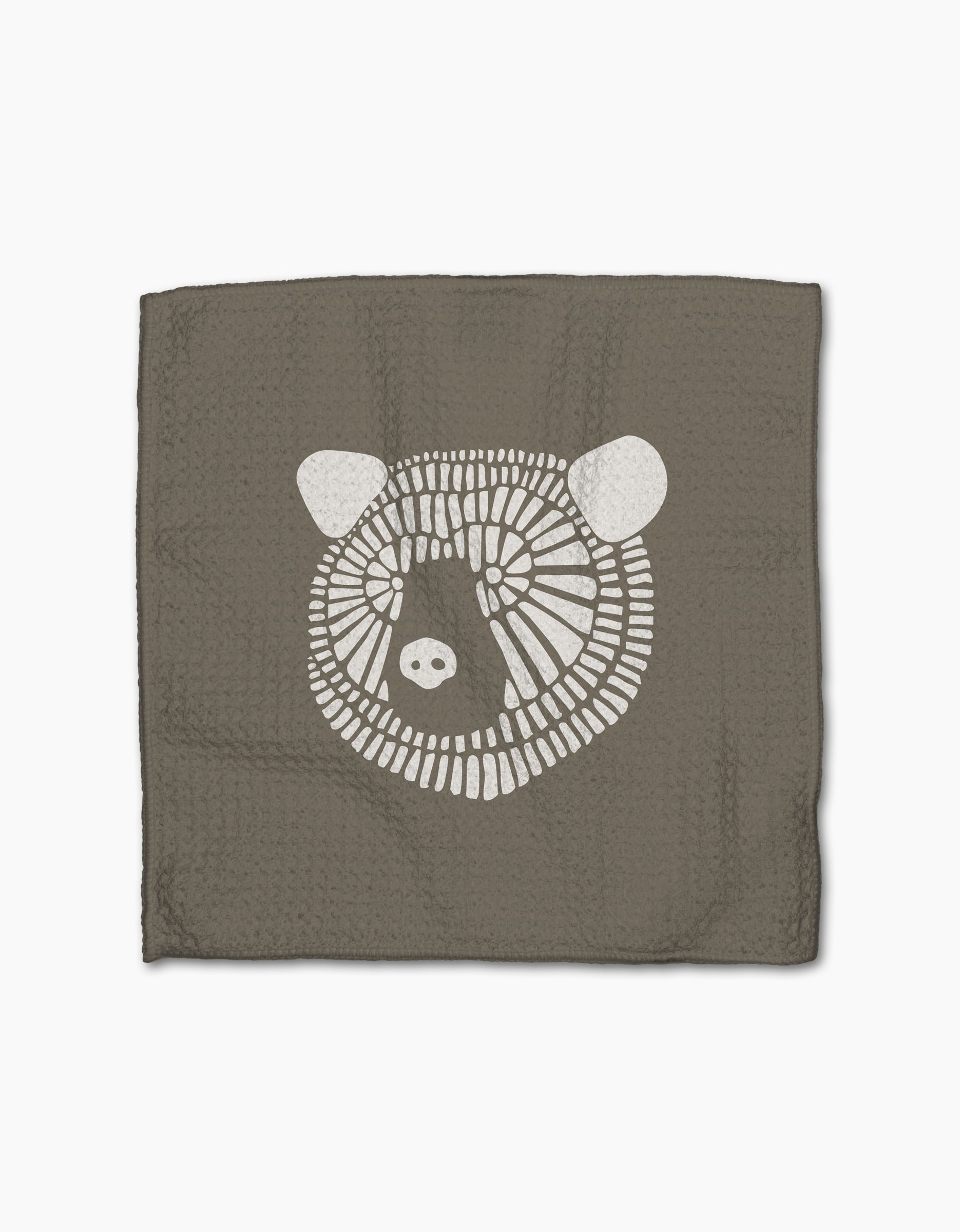 Forest Animals by Rosa Kichline: a square, textured brown recycled cloth with a simple white bear face illustration centered on a plain white background.