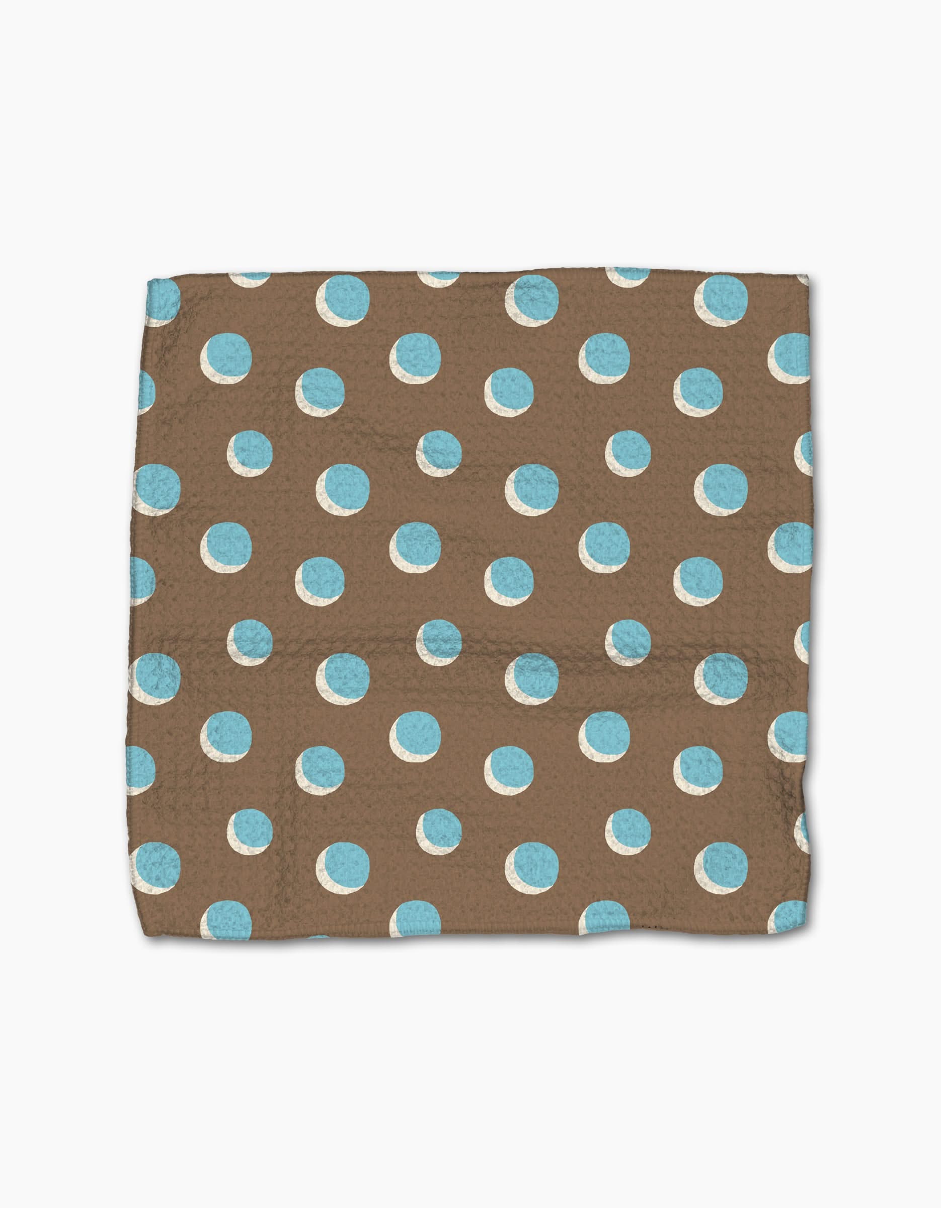 The Geometry Four In A Row Dot is a brown rectangular dishcloth with evenly spaced light blue and white polka dots, crafted from super-absorbent Geoweave fabric, shown laid flat on a white background.