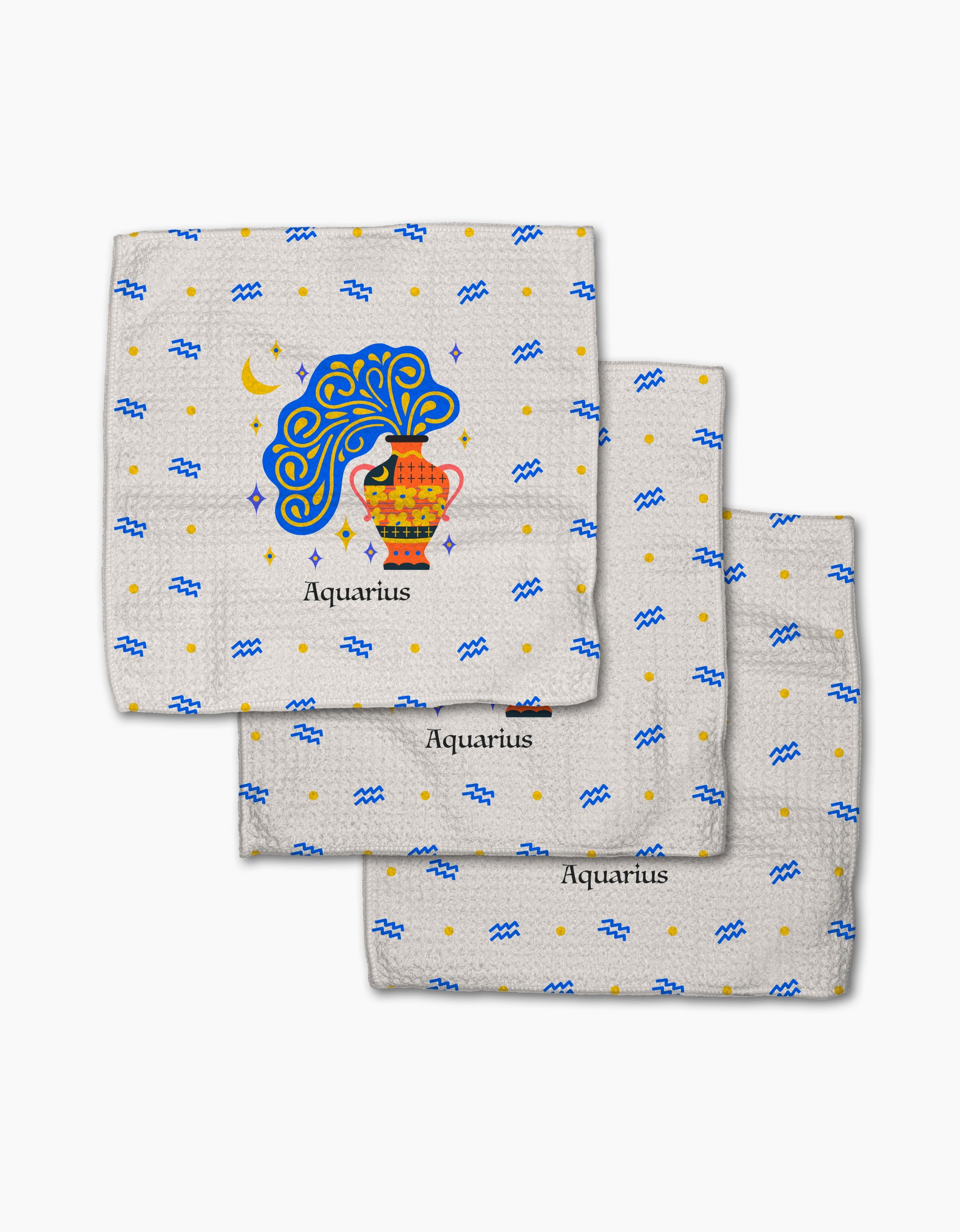 Three folded absorbent dish towels by Heather Zhou, called "Free Aquarius," feature the Aquarius zodiac sign with a colorful water jug, blue waves, moon, stars, and "Aquarius" text on a light patterned background.