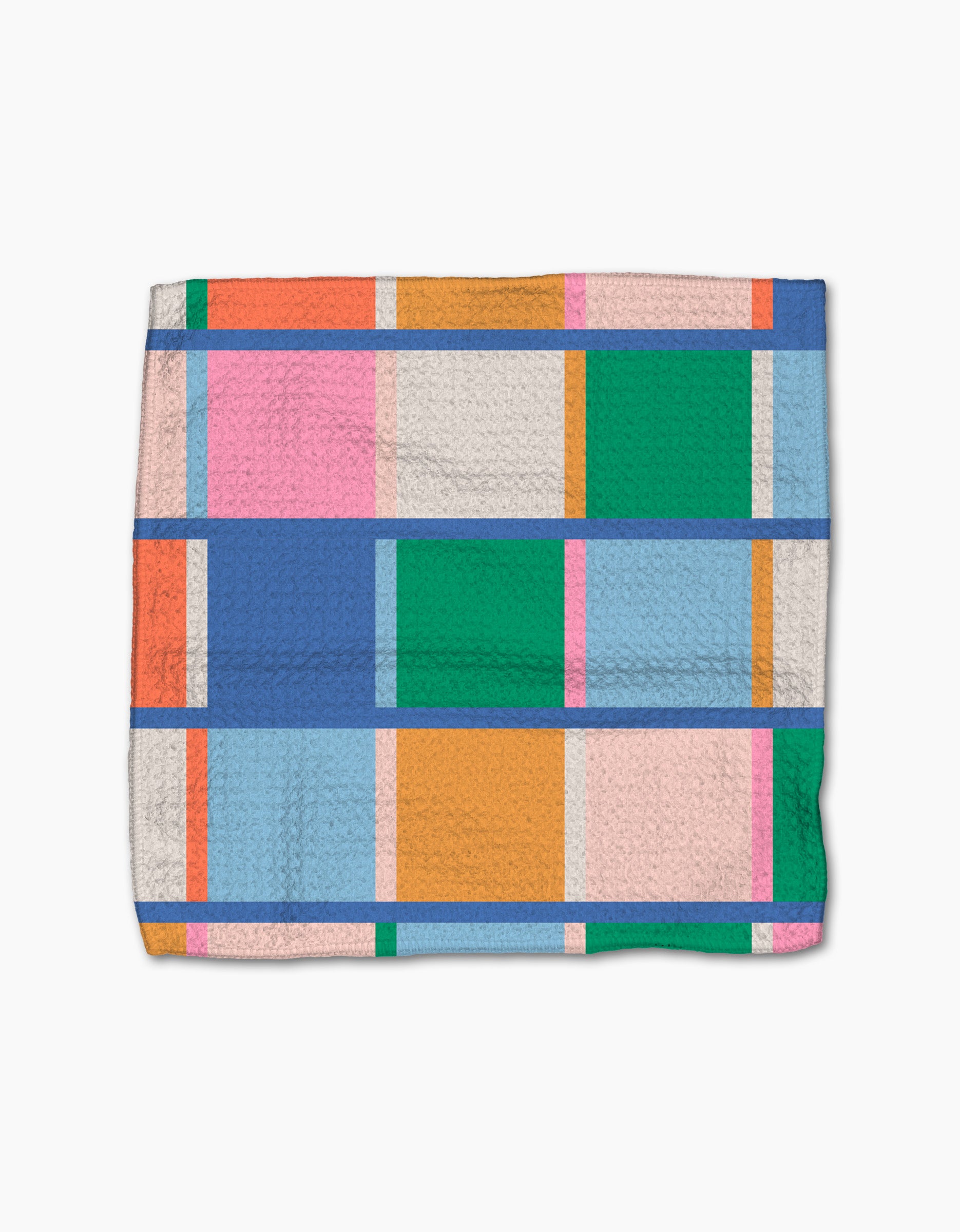 The Jennifer Bouron Fruit Basket blanket features a textured Geoweave and a geometric pattern of rectangles in blue, green, orange, pink, and peach, separated by thin blue lines on a white background.