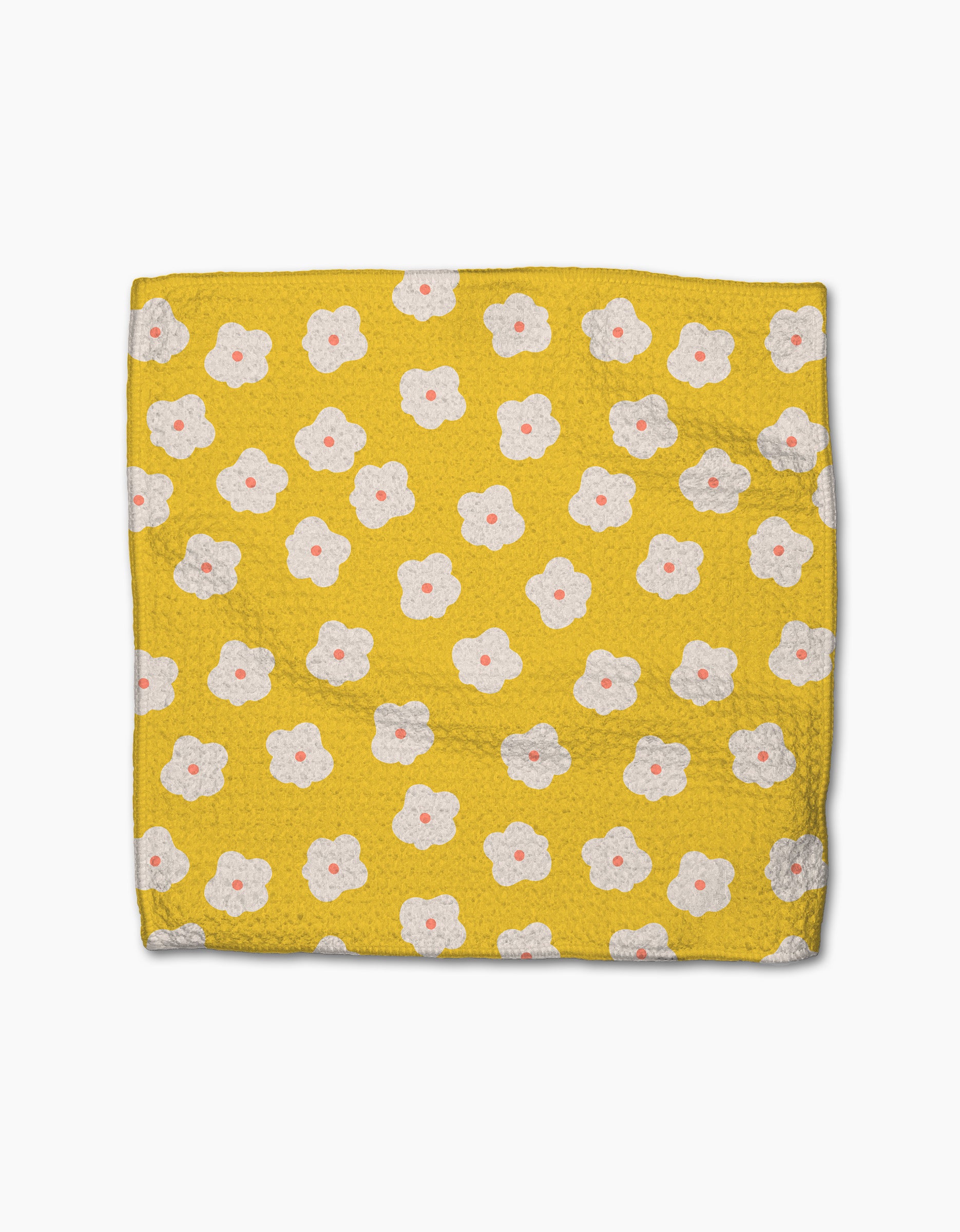 The Sara Mari Garden Crush blanket, crafted from recycled materials, features a yellow textured design with a repeating pattern of white flowers with pink centers and is shown flat on a white background.