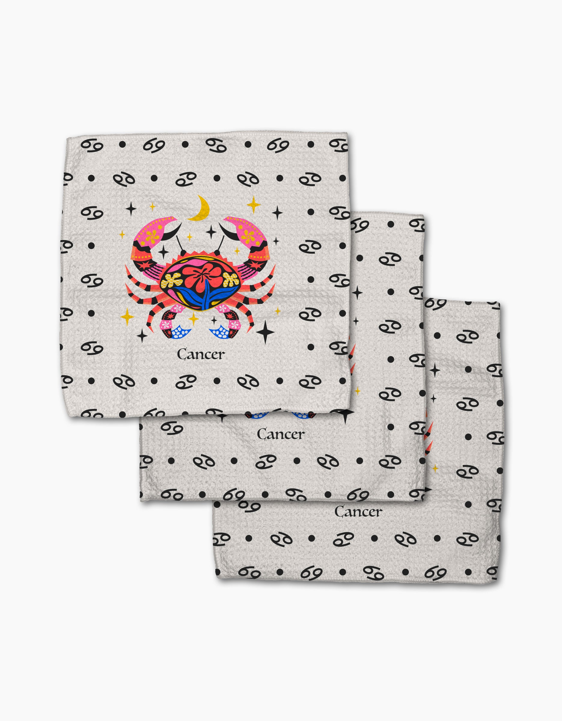 Heather Zhou’s Gentle Cancer napkins (set of 3) feature a colorful crab with stars and a moon, black Cancer zodiac symbols, and “Cancer” printed below. Made from recycled materials.