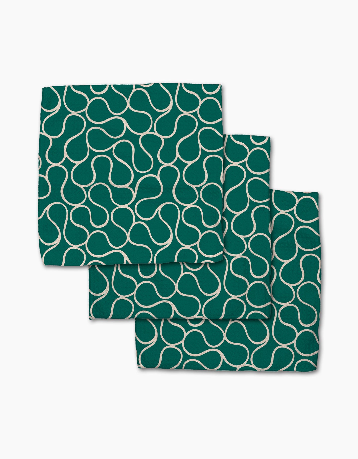 Three Green Loops cloth napkins by Gerdadzy, made from recycled materials, showcase a white abstract curvy line pattern and are neatly stacked on a white background.