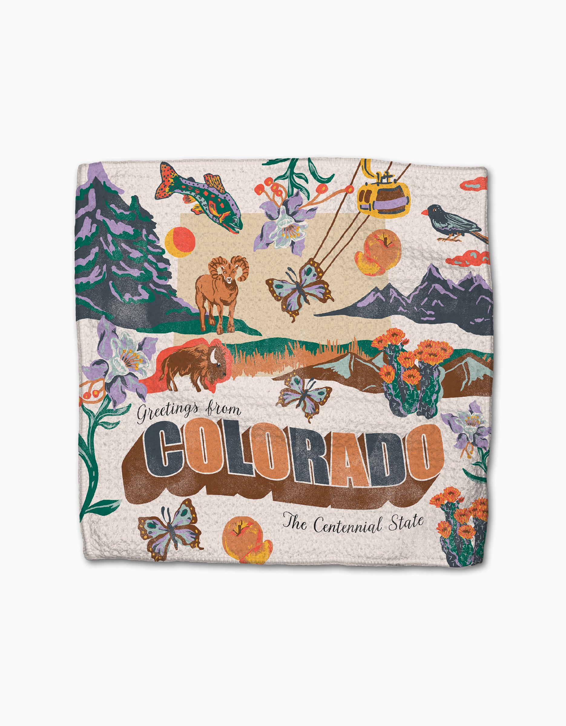 The Geometry "Greetings From Colorado" blanket showcases vibrant Colorado-themed illustrations—mountains, a bighorn sheep, trout, wildflowers, butterflies, a cable car, peaches—and reads "Greetings from COLORADO The Centennial State." Made from recycled materials.